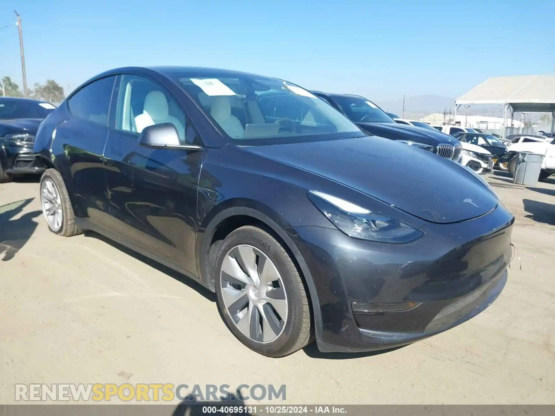 1 Photograph of a damaged car 7SAYGDED9RF018063 TESLA MODEL Y 2024