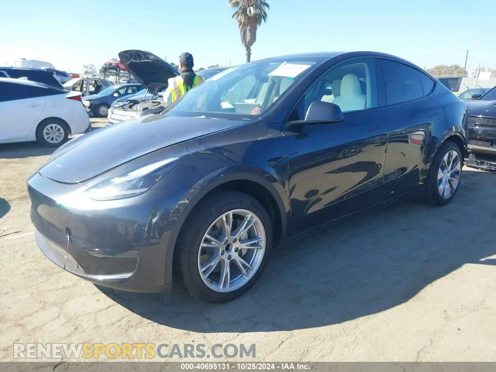 2 Photograph of a damaged car 7SAYGDED9RF018063 TESLA MODEL Y 2024
