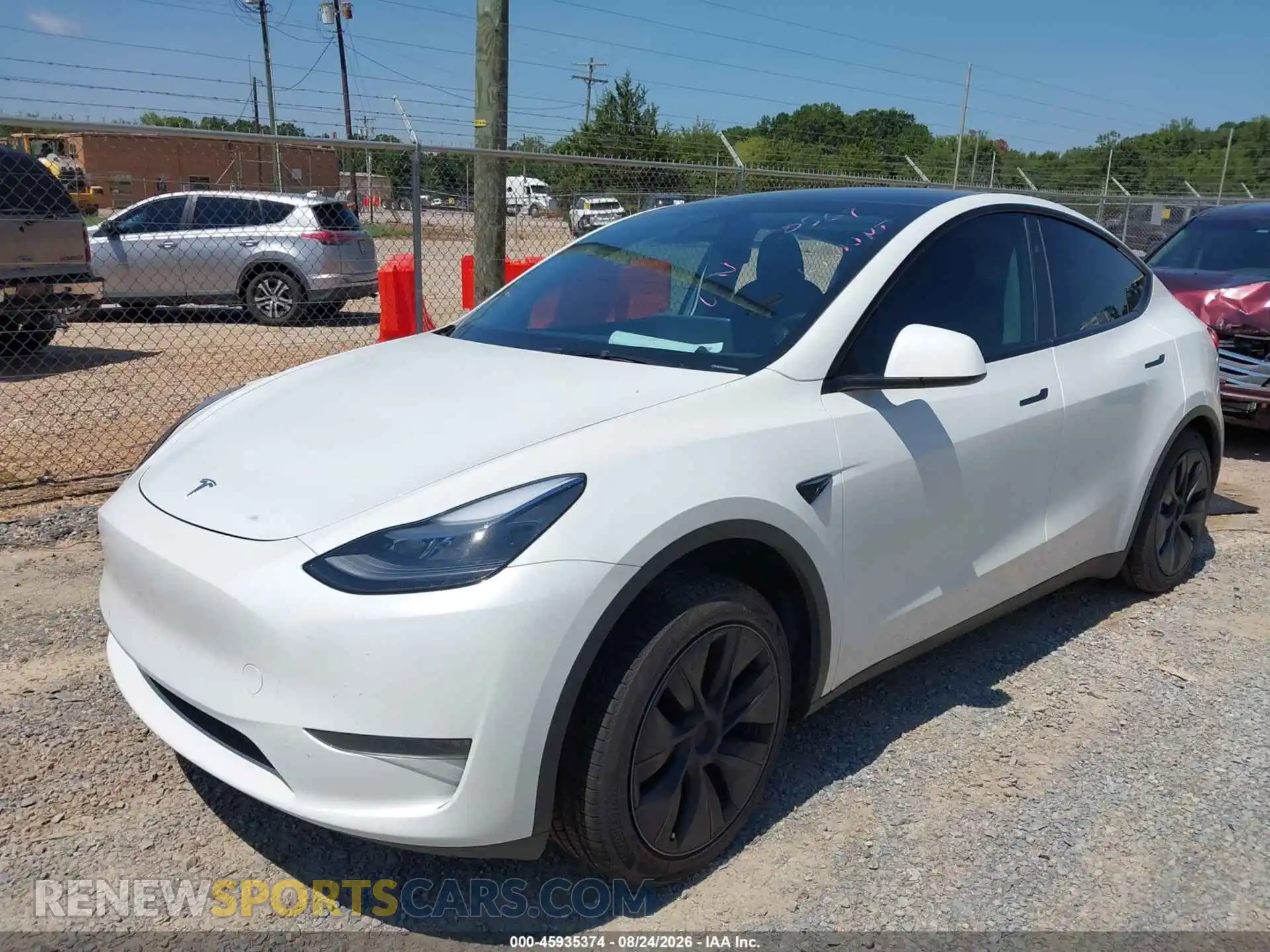2 fotografías del automóvil dañado 7SAYGDEDXRA320569 TESLA MODEL Y 2024