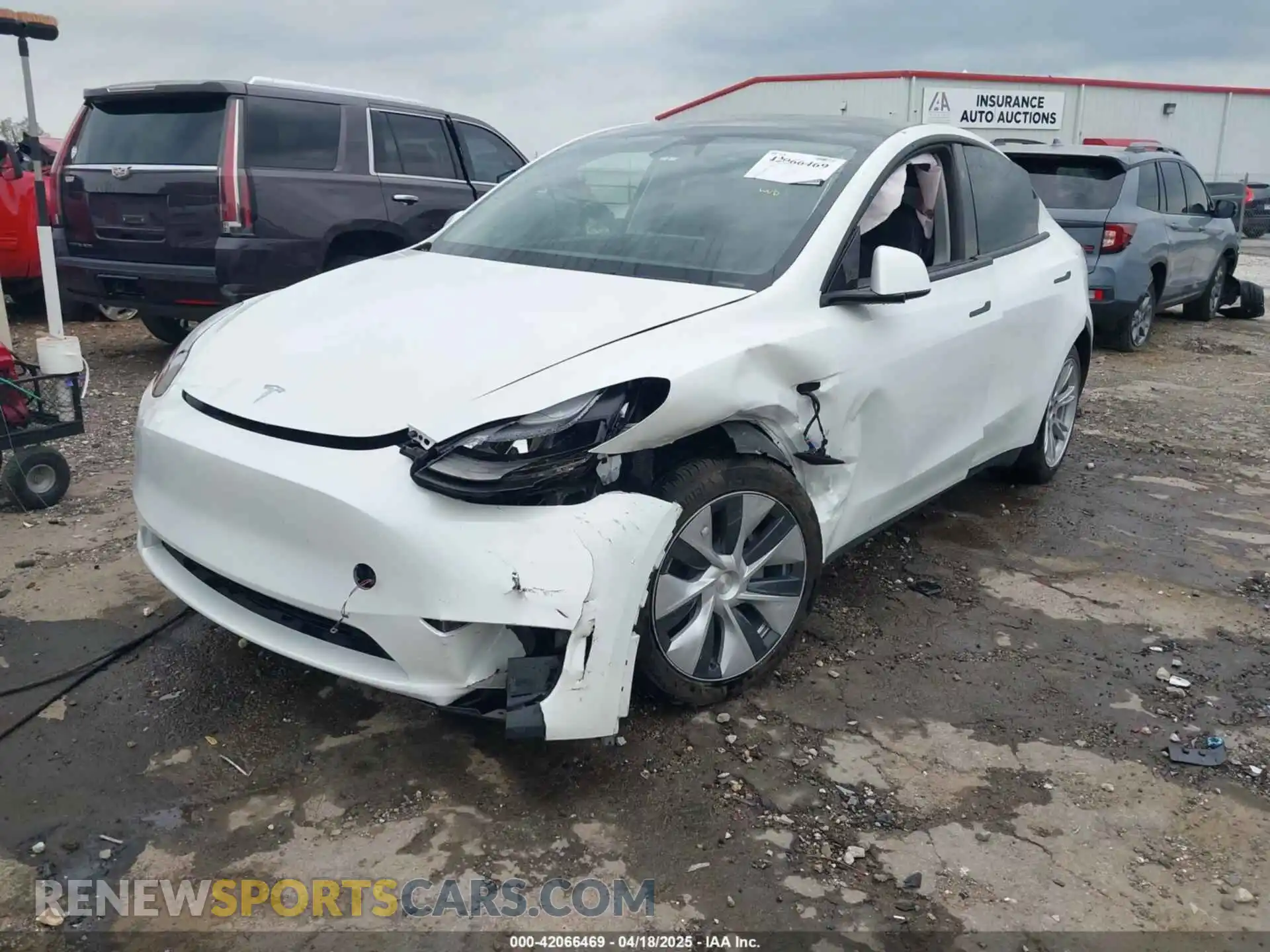 2 fotografías del automóvil dañado 7SAYGDEDXRF035969 TESLA MODEL Y 2024