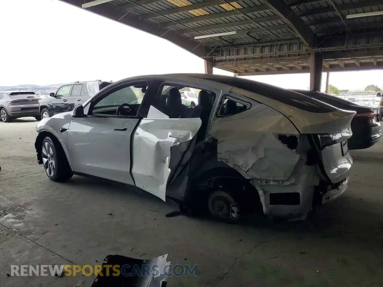 2 fotografías del automóvil dañado 7SAYGDEE1RF054192 TESLA MODEL Y 2024