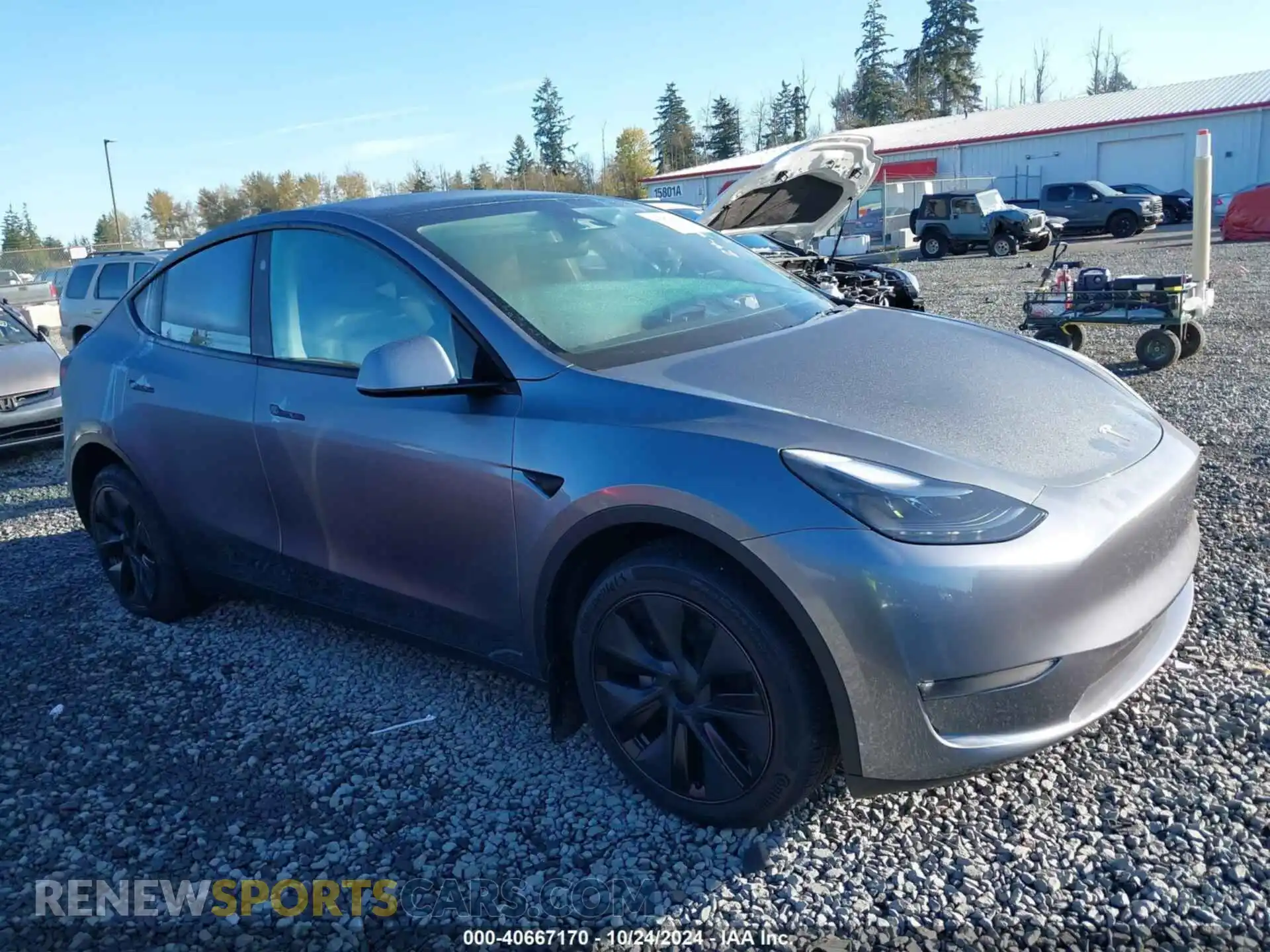 1 Photograph of a damaged car 7SAYGDEE1RF200705 TESLA MODEL Y 2024