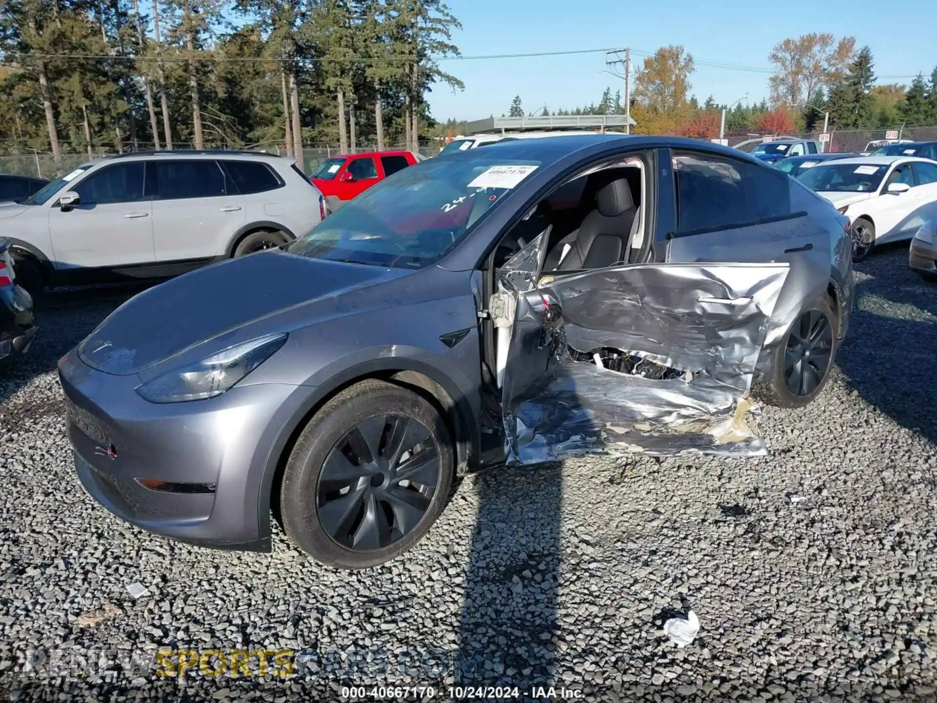 2 Photograph of a damaged car 7SAYGDEE1RF200705 TESLA MODEL Y 2024