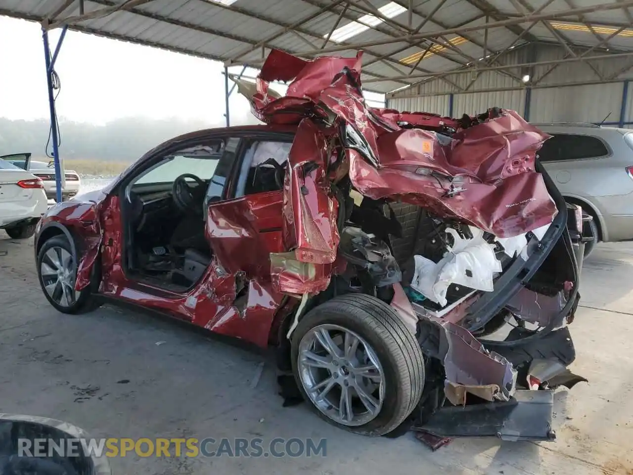 2 fotografías del automóvil dañado 7SAYGDEE2RA227134 TESLA MODEL Y 2024
