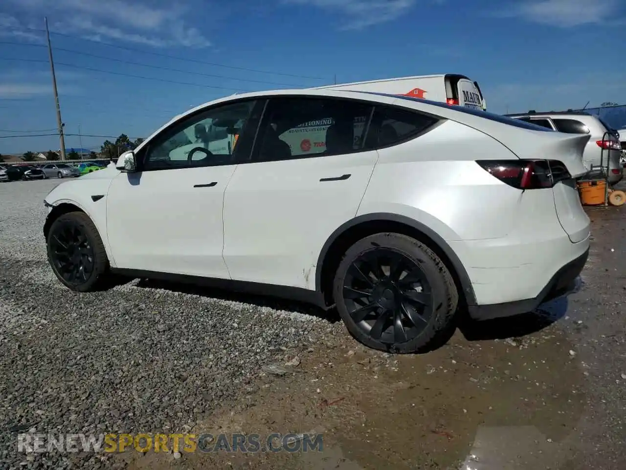 2 Photograph of a damaged car 7SAYGDEE2RA265477 TESLA MODEL Y 2024
