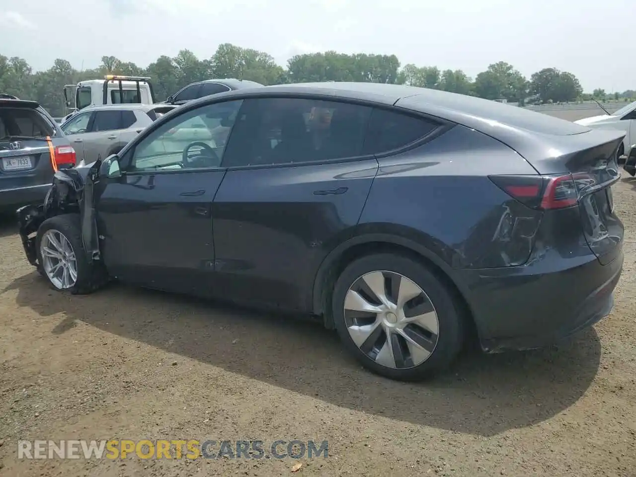 2 fotografías del automóvil dañado 7SAYGDEE2RF986871 TESLA MODEL Y 2024