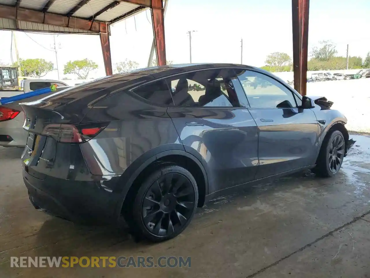 3 Photograph of a damaged car 7SAYGDEE3RA280814 TESLA MODEL Y 2024