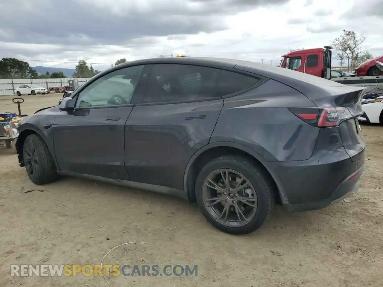 2 Photograph of a damaged car 7SAYGDEE3RF117910 TESLA MODEL Y 2024