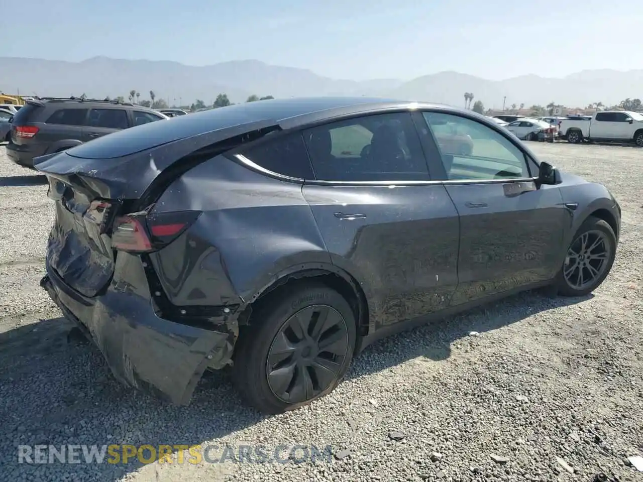 3 Photograph of a damaged car 7SAYGDEE3RF121102 TESLA MODEL Y 2024