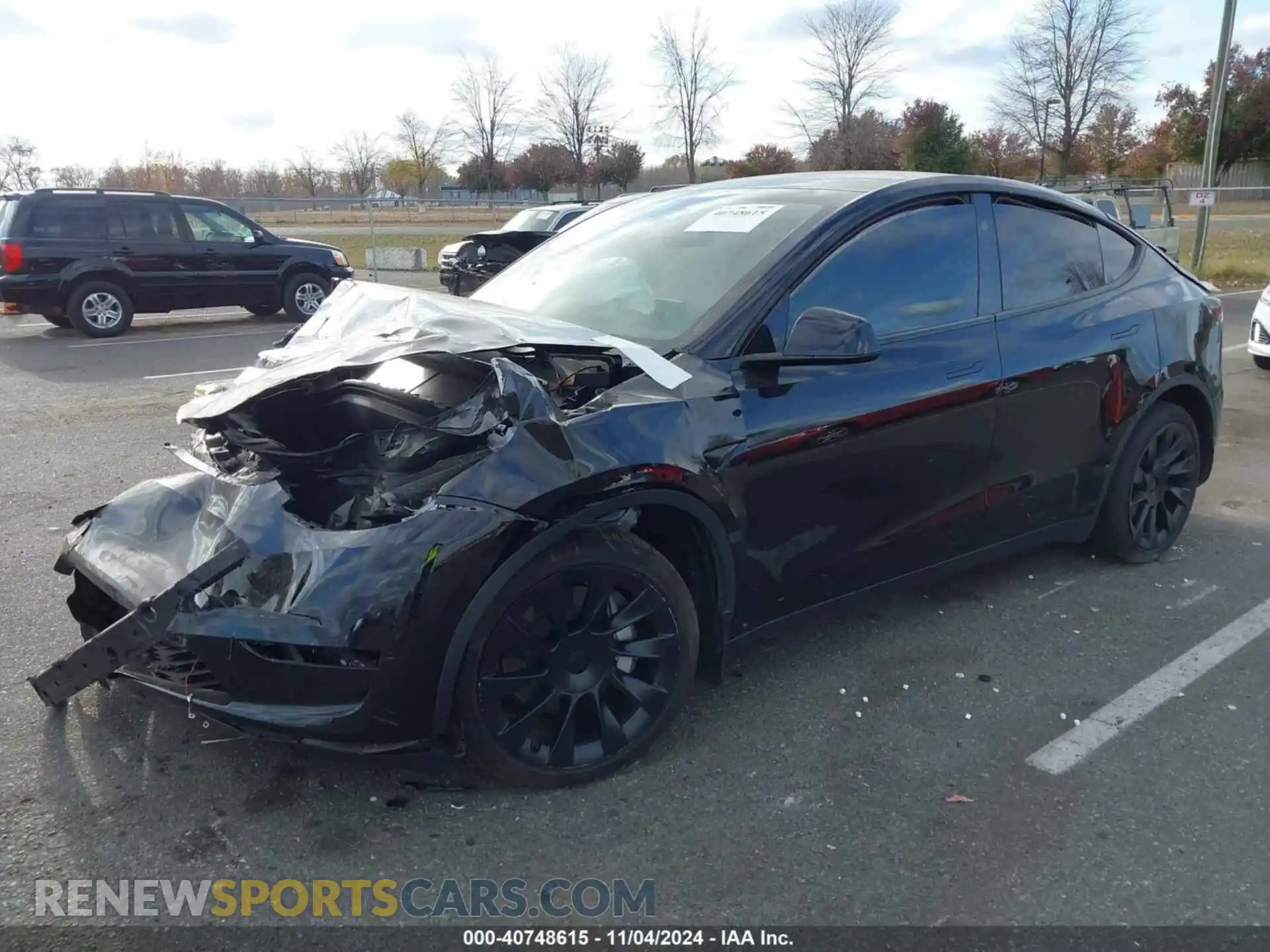 2 fotografías del automóvil dañado 7SAYGDEE4RA233940 TESLA MODEL Y 2024