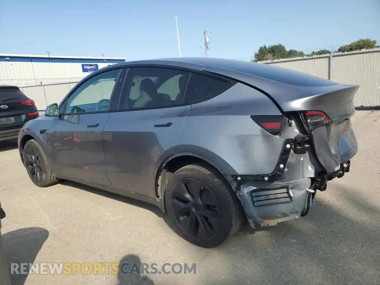2 fotografías del automóvil dañado 7SAYGDEE4RF210497 TESLA MODEL Y 2024