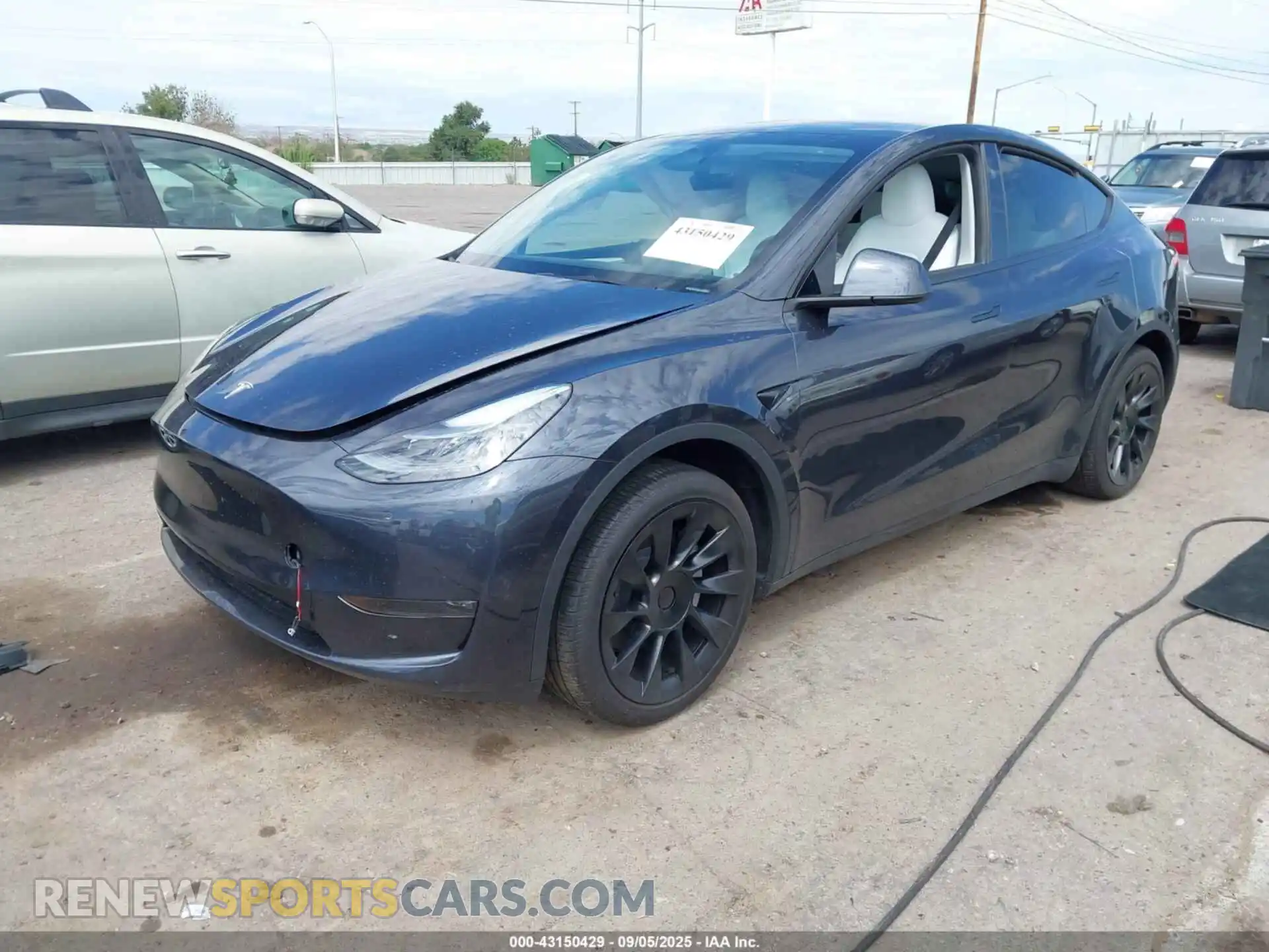 2 Photograph of a damaged car 7SAYGDEE5RA225345 TESLA MODEL Y 2024