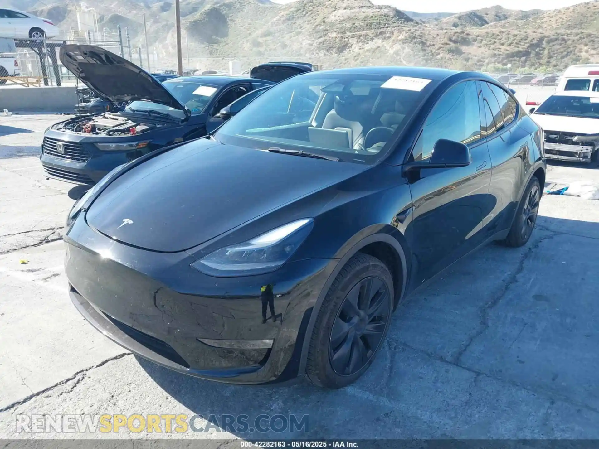 2 Photograph of a damaged car 7SAYGDEE5RF115074 TESLA MODEL Y 2024
