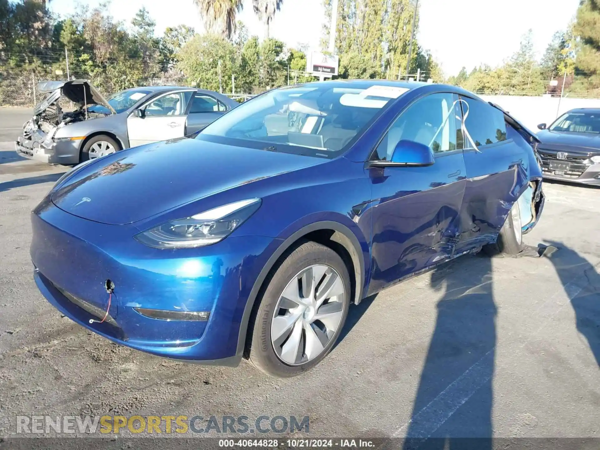 2 fotografías del automóvil dañado 7SAYGDEE7RF031404 TESLA MODEL Y 2024