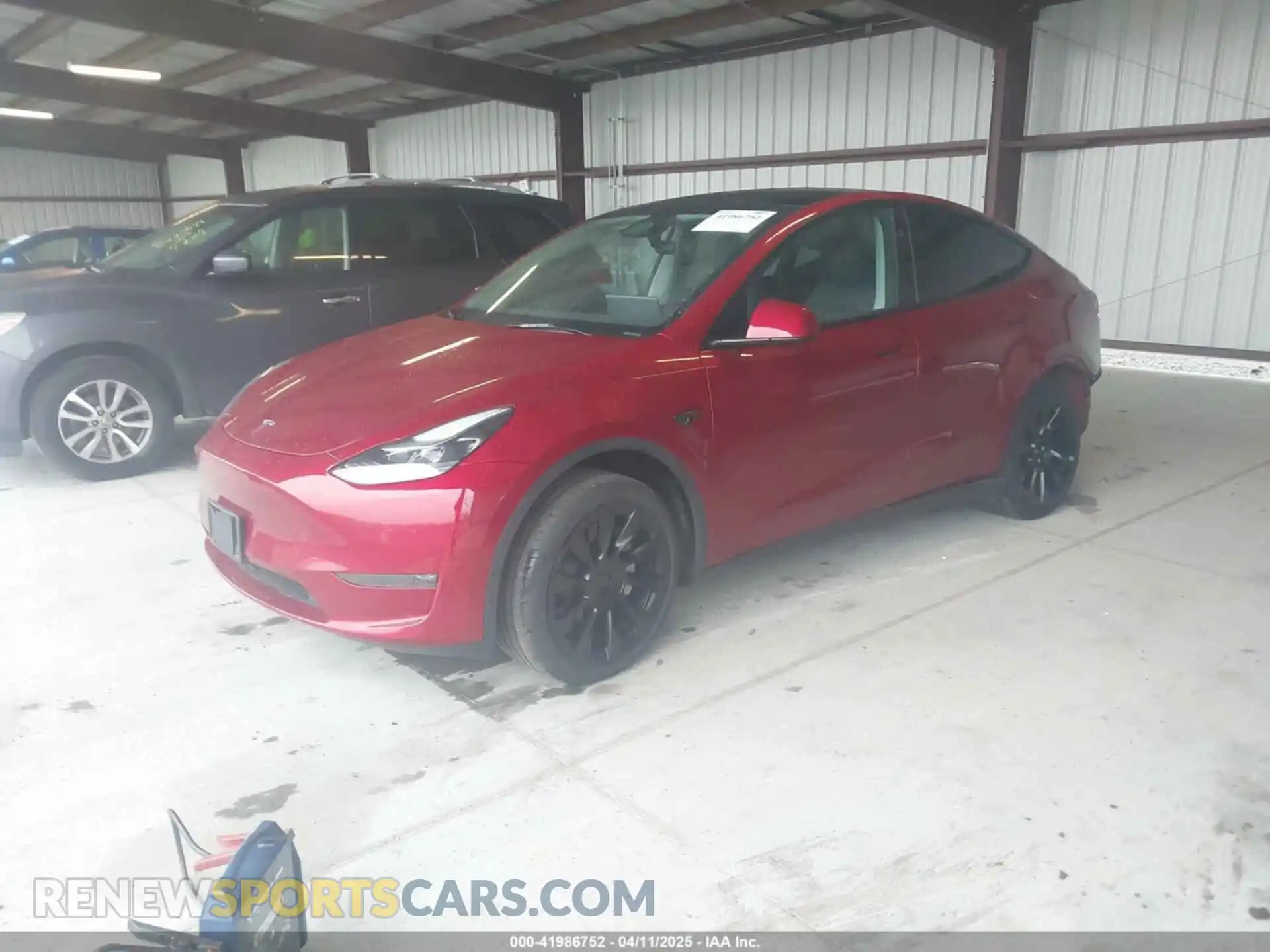 2 Photograph of a damaged car 7SAYGDEE9RA222559 TESLA MODEL Y 2024