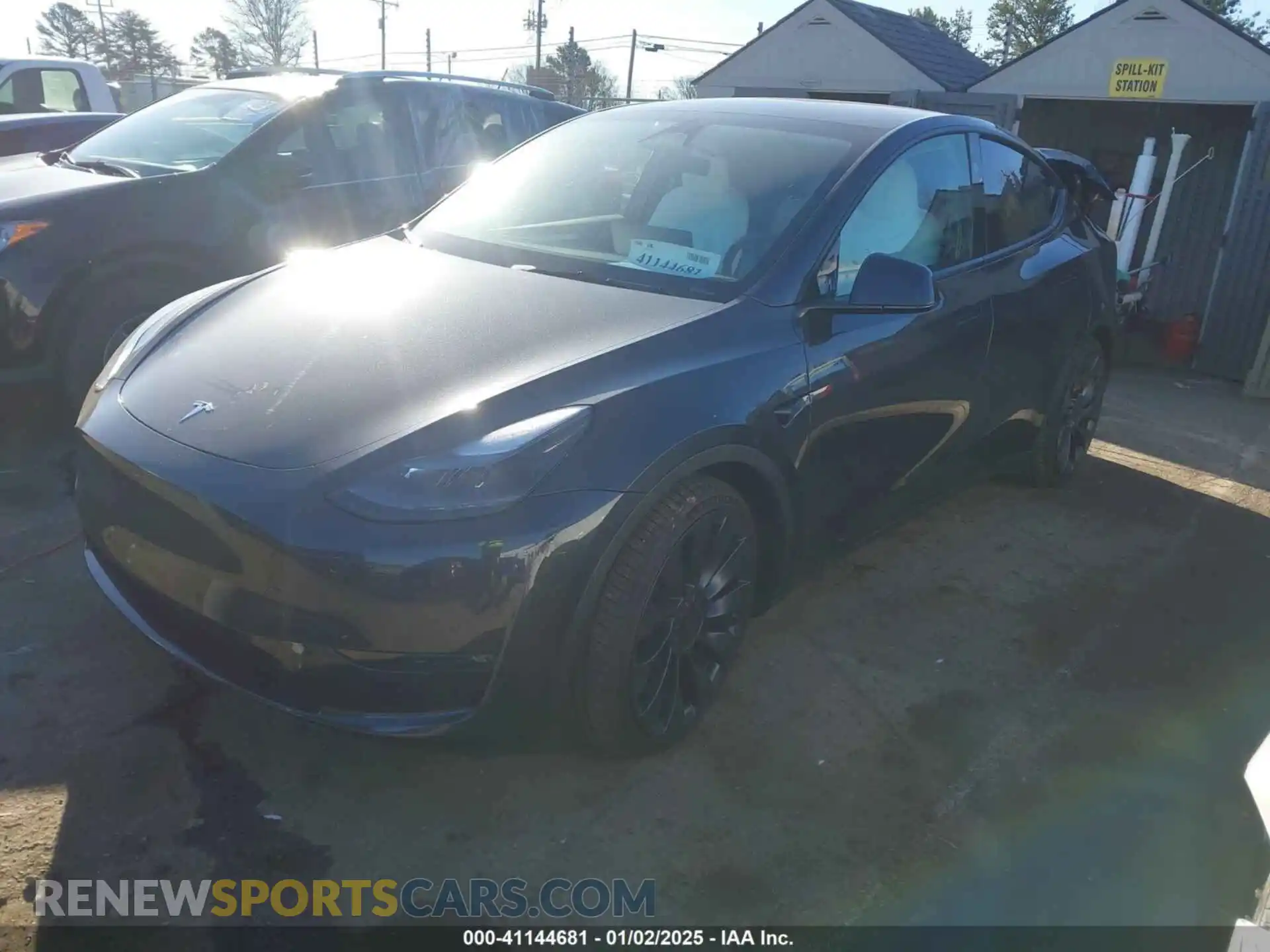 2 Photograph of a damaged car 7SAYGDEF1RF040821 TESLA MODEL Y 2024