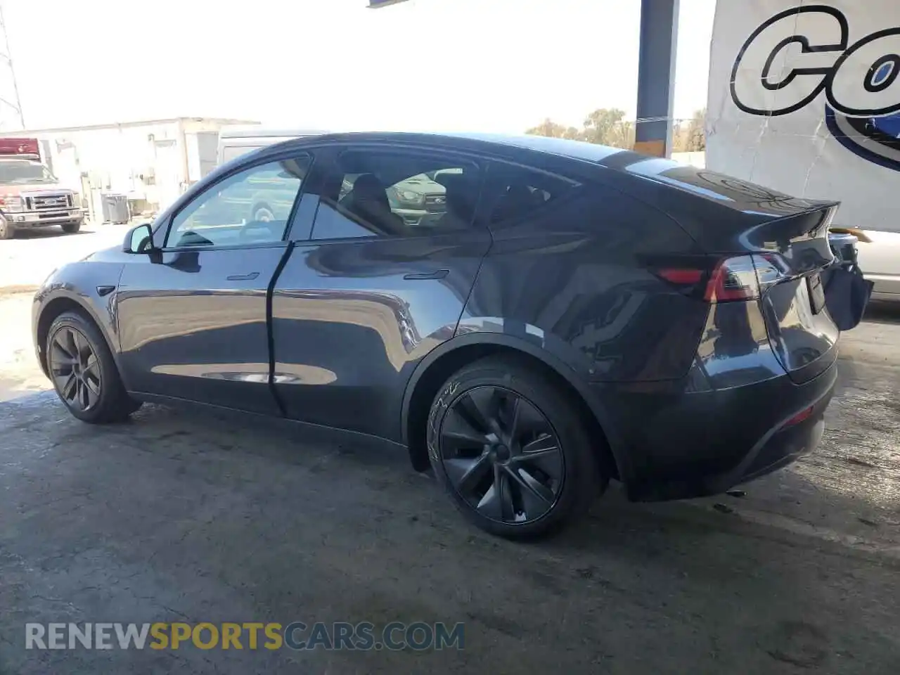 2 fotografías del automóvil dañado 7SAYGDED2SF280979 TESLA MODEL Y 2025