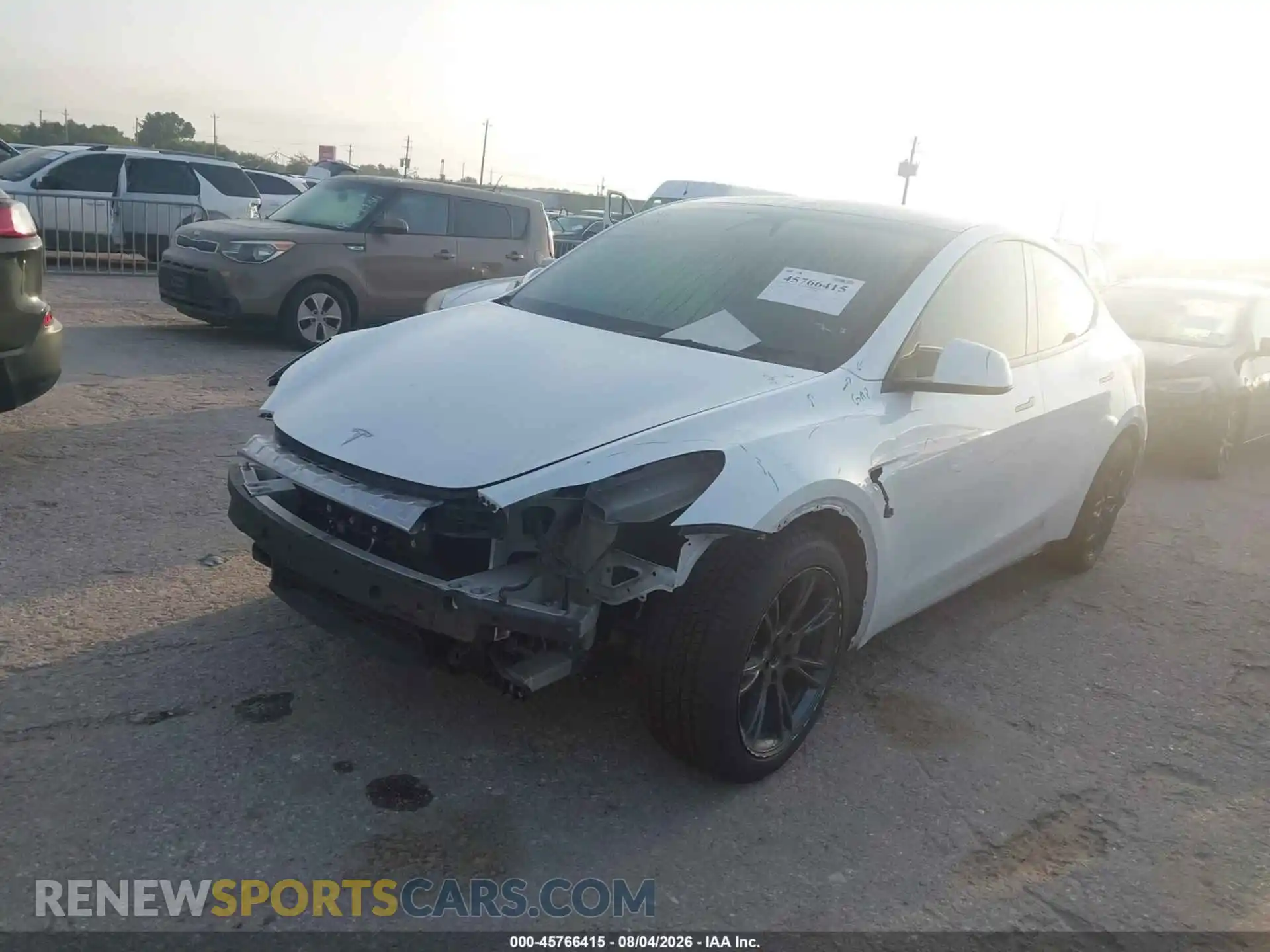 2 fotografías del automóvil dañado 7SAYGDED6SA356085 TESLA MODEL Y 2025