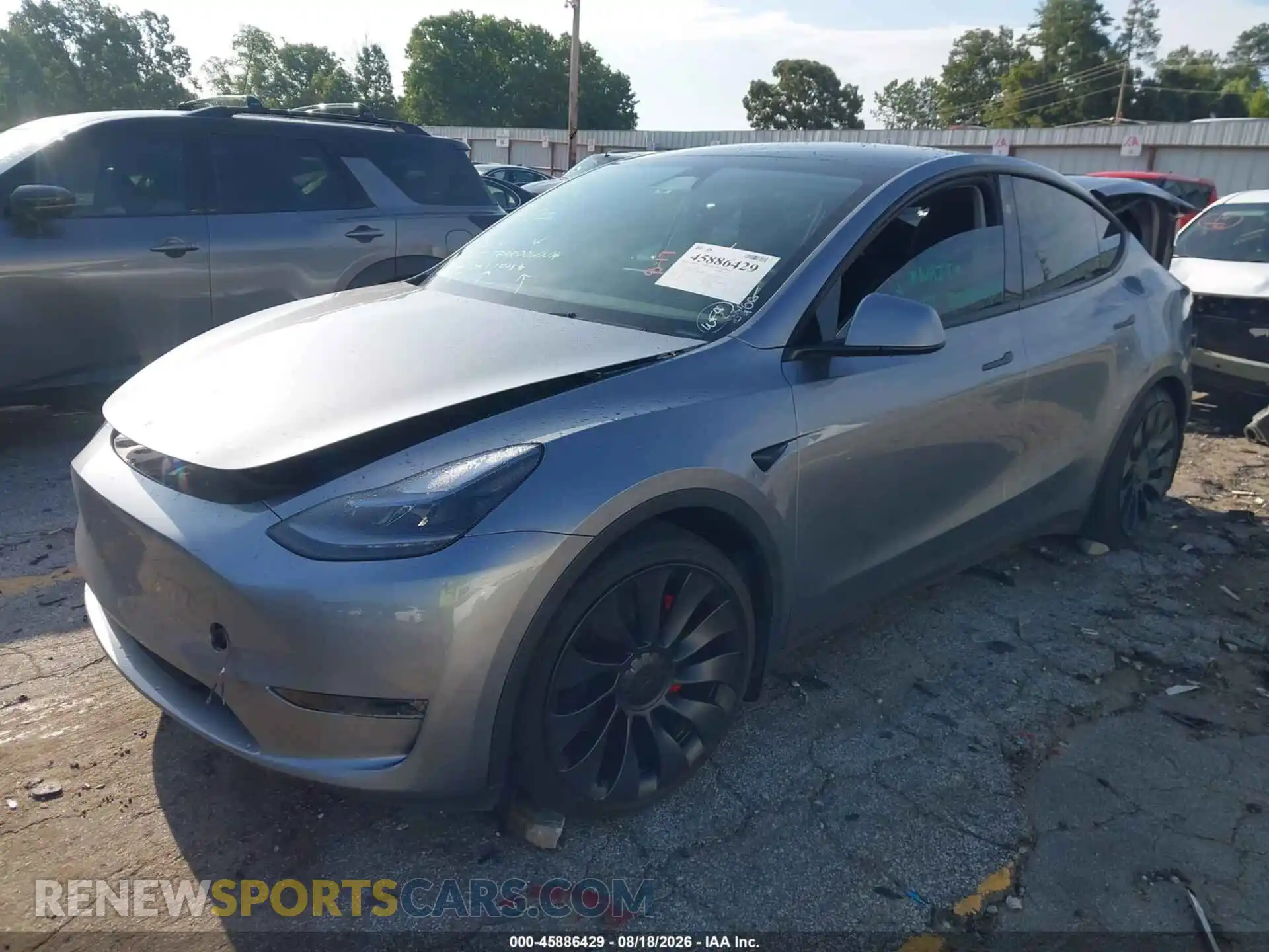 2 fotografías del automóvil dañado 7SAYGDEF9SA338715 TESLA MODEL Y 2025