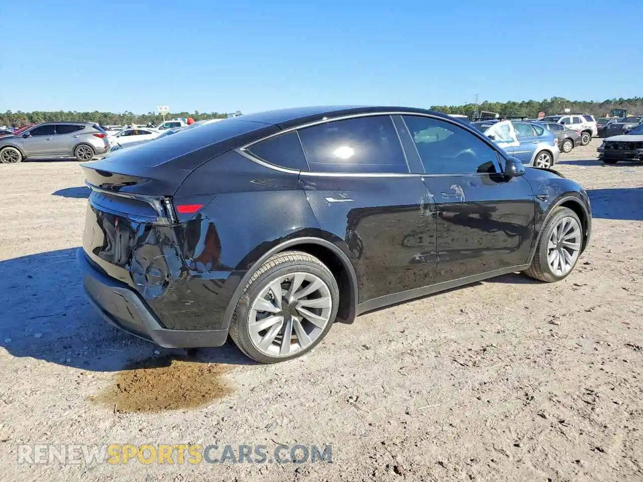3 fotografías del automóvil dañado 7SAYGDED0TA593804 TESLA MODEL Y 2026