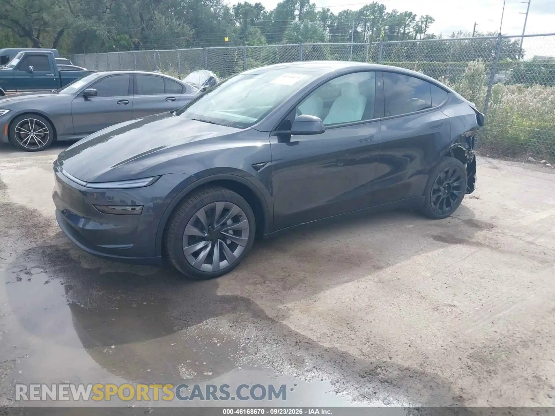 2 fotografías del automóvil dañado 7SAYGDED4TA642261 TESLA MODEL Y 2026