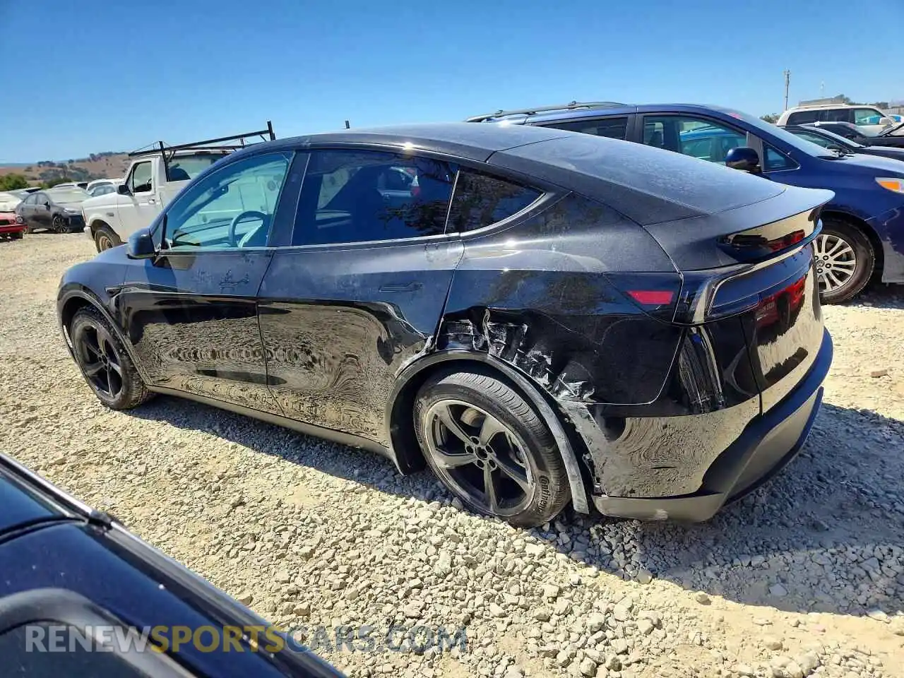 2 fotografías del automóvil dañado 7SAYGDED8TF676383 TESLA MODEL Y 2026