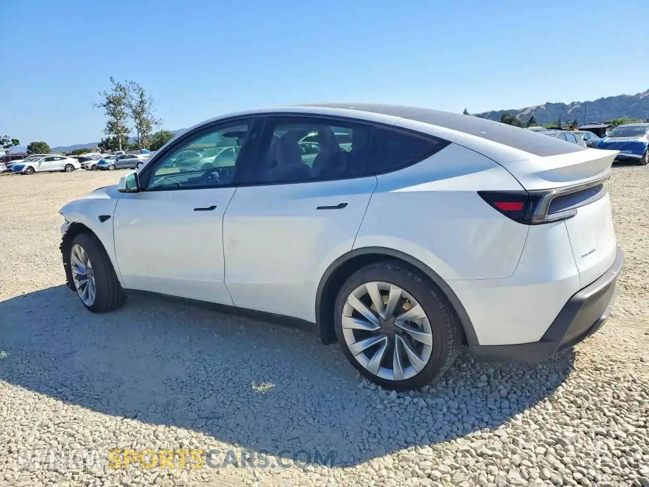 2 fotografías del automóvil dañado 7SAYGDEE5TA382610 TESLA MODEL Y 2026