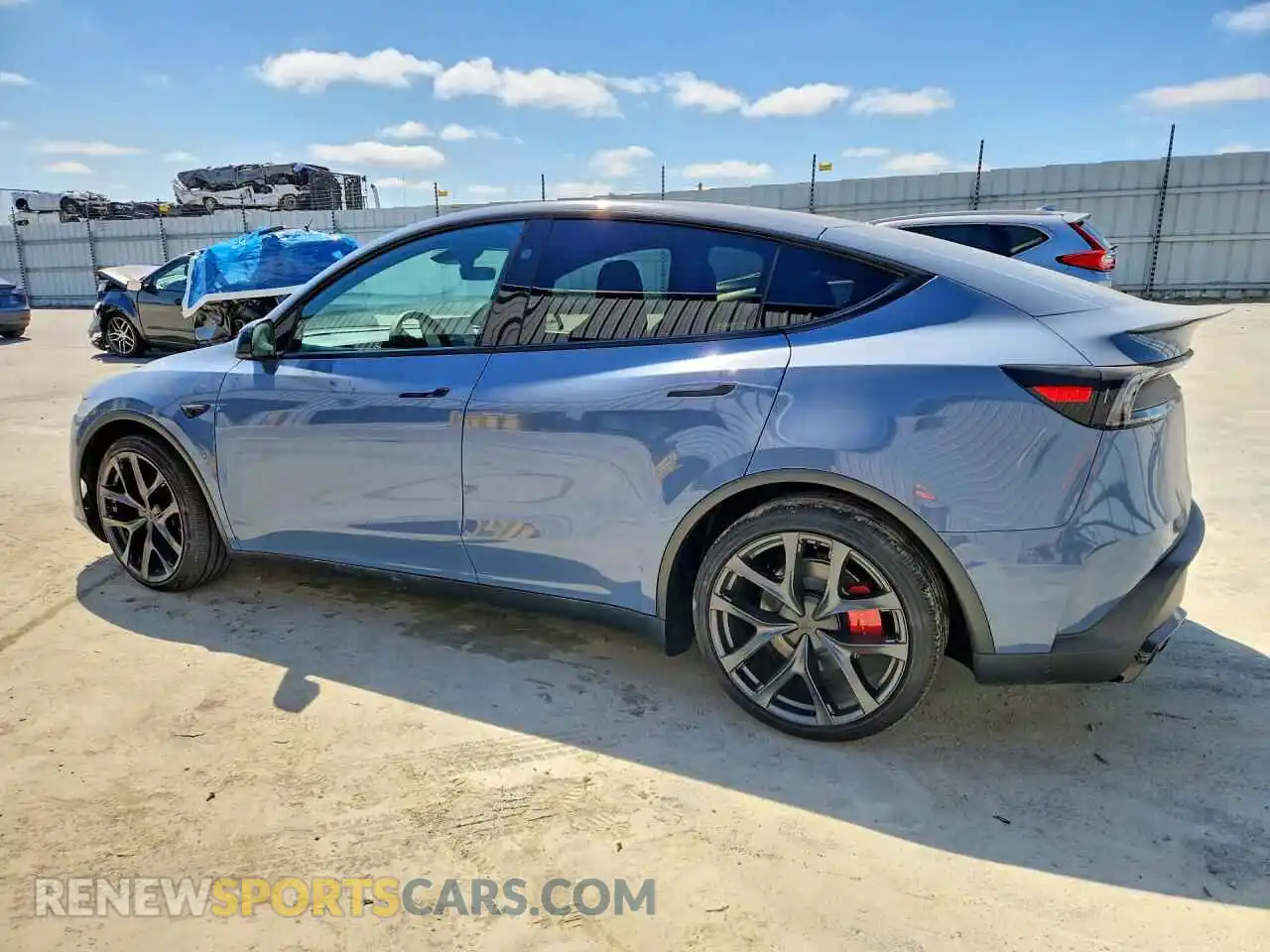 2 fotografías del automóvil dañado 7SAYGDET8TA711816 TESLA MODEL Y 2026