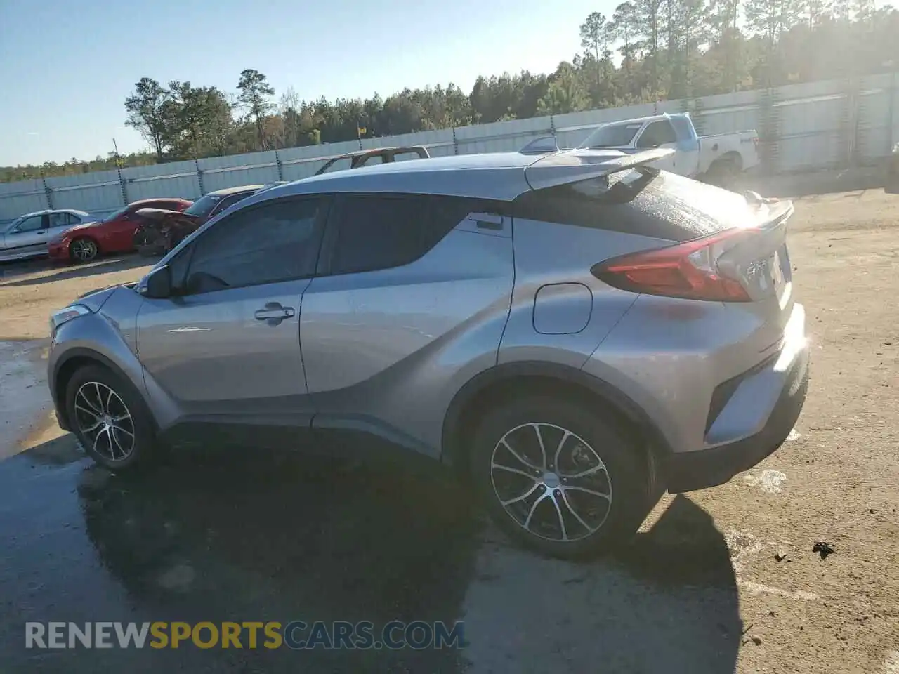 2 fotografías del automóvil dañado NMTKHMBX9KR091383 TOYOTA C-HR 2019