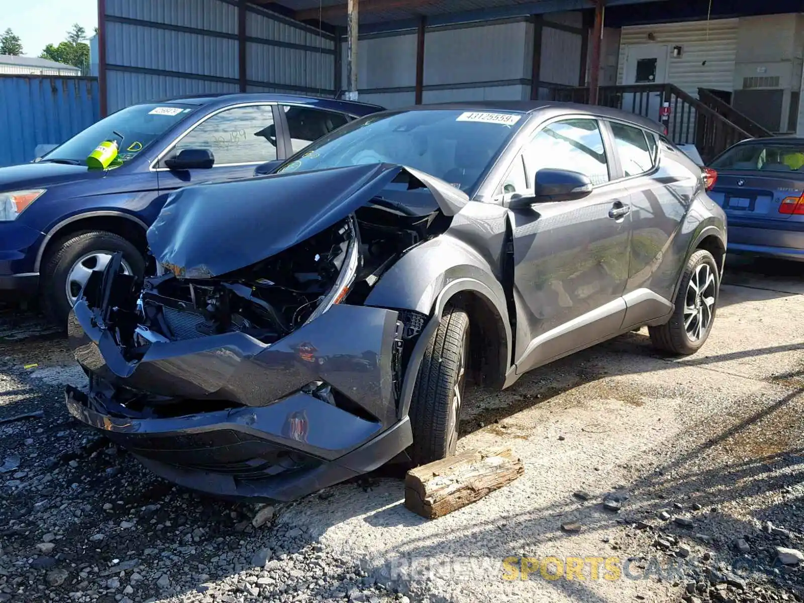 2 Photograph of a damaged car NMTKHMBX1KR088400 TOYOTA C-HR XLE 2019