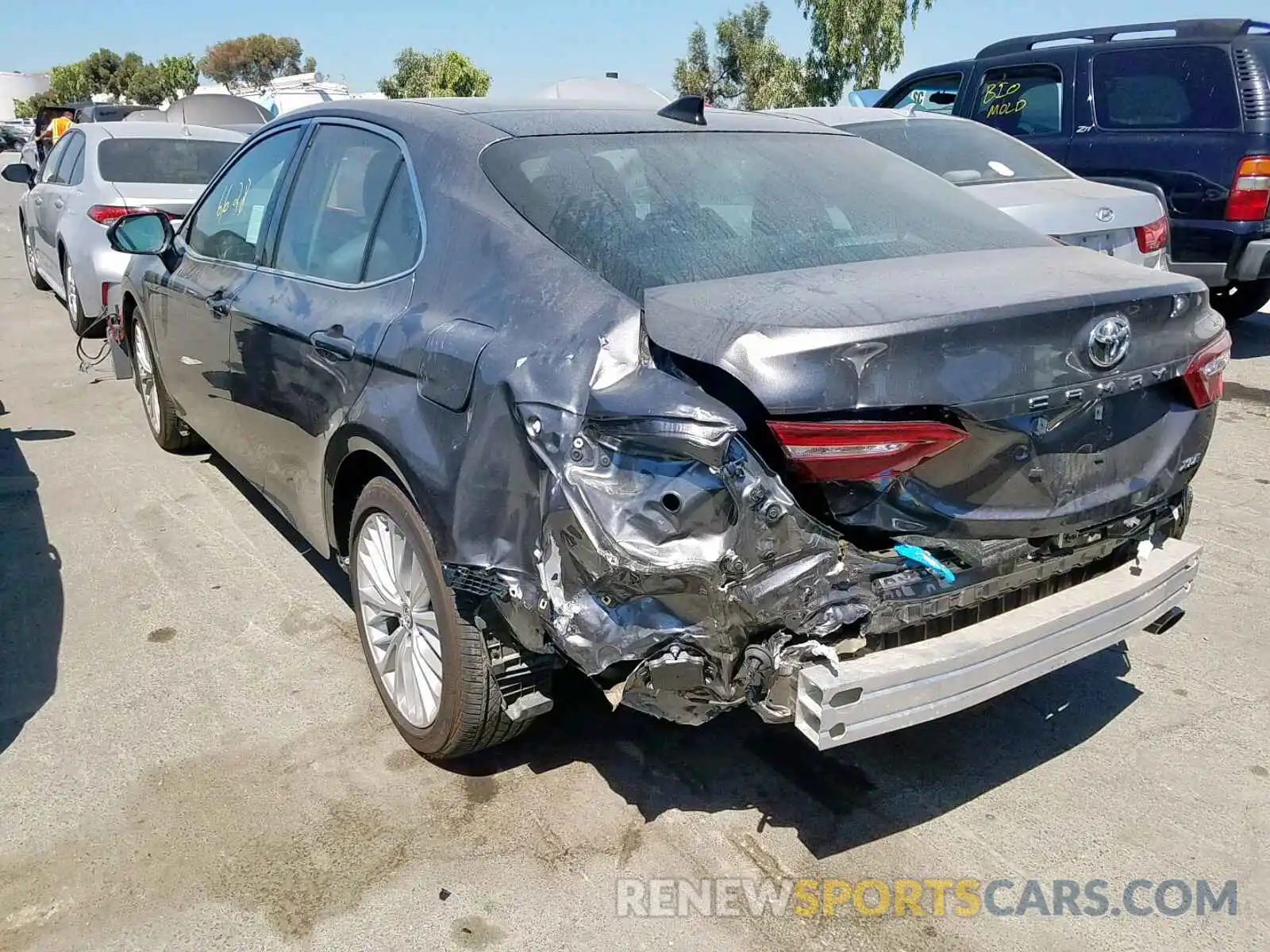 3 Photograph of a damaged car 4T1B11HK0KU164440 TOYOTA CAMRY 2019