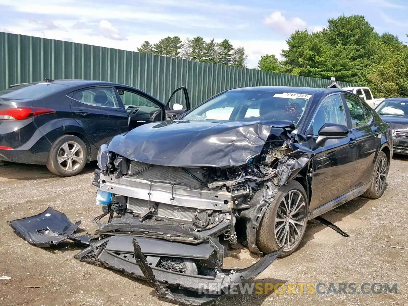 2 Photograph of a damaged car 4T1B11HK0KU229710 TOYOTA CAMRY 2019