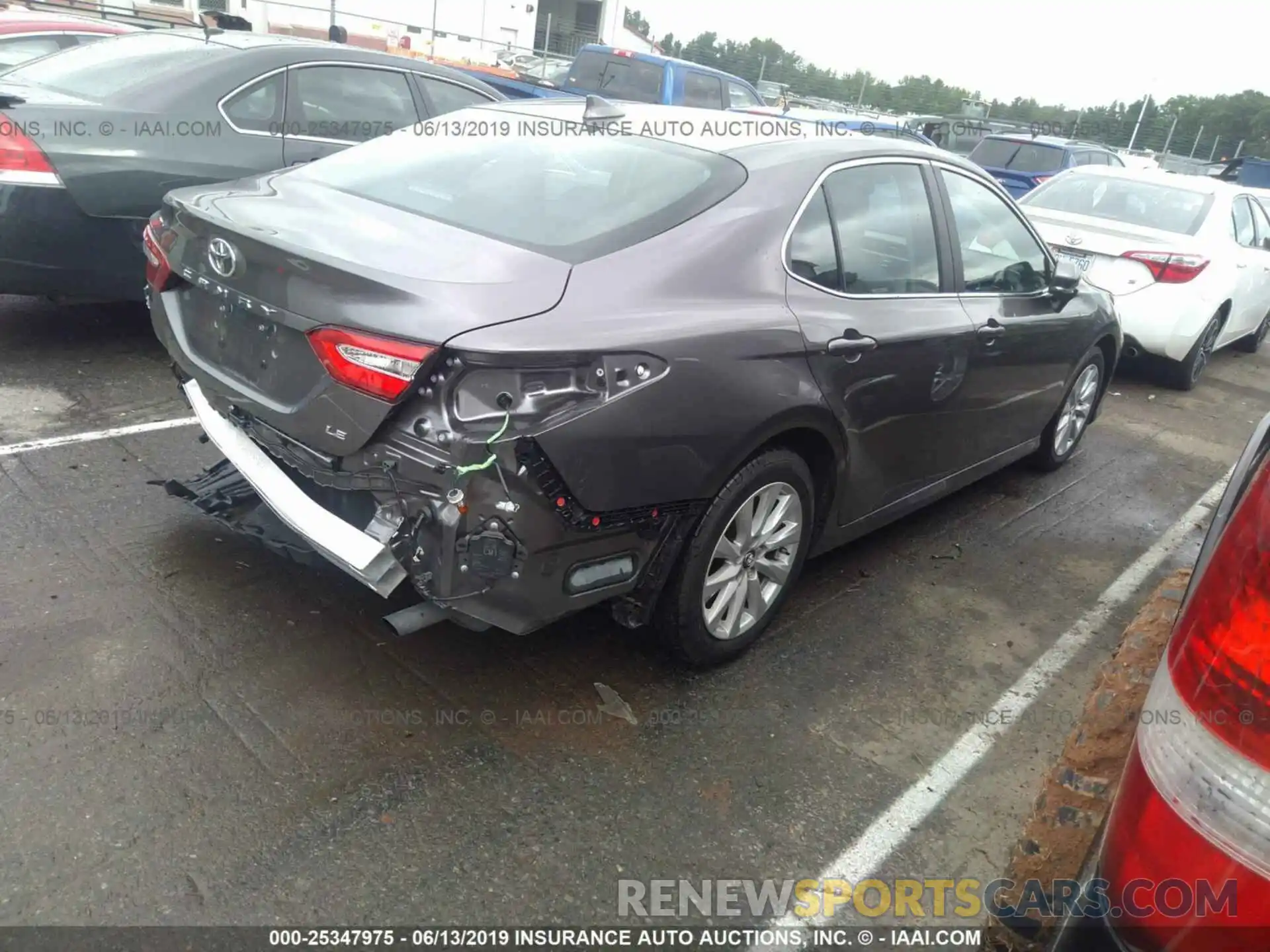 4 Photograph of a damaged car 4T1B11HK1KU696571 TOYOTA CAMRY 2019