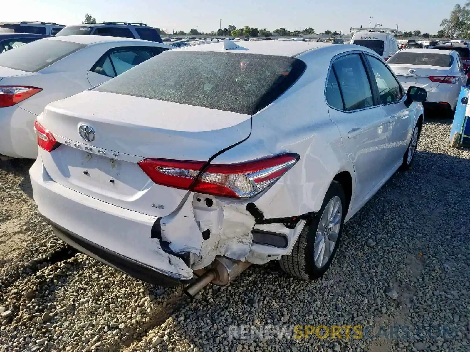 4 Photograph of a damaged car 4T1B11HK1KU741301 TOYOTA CAMRY 2019