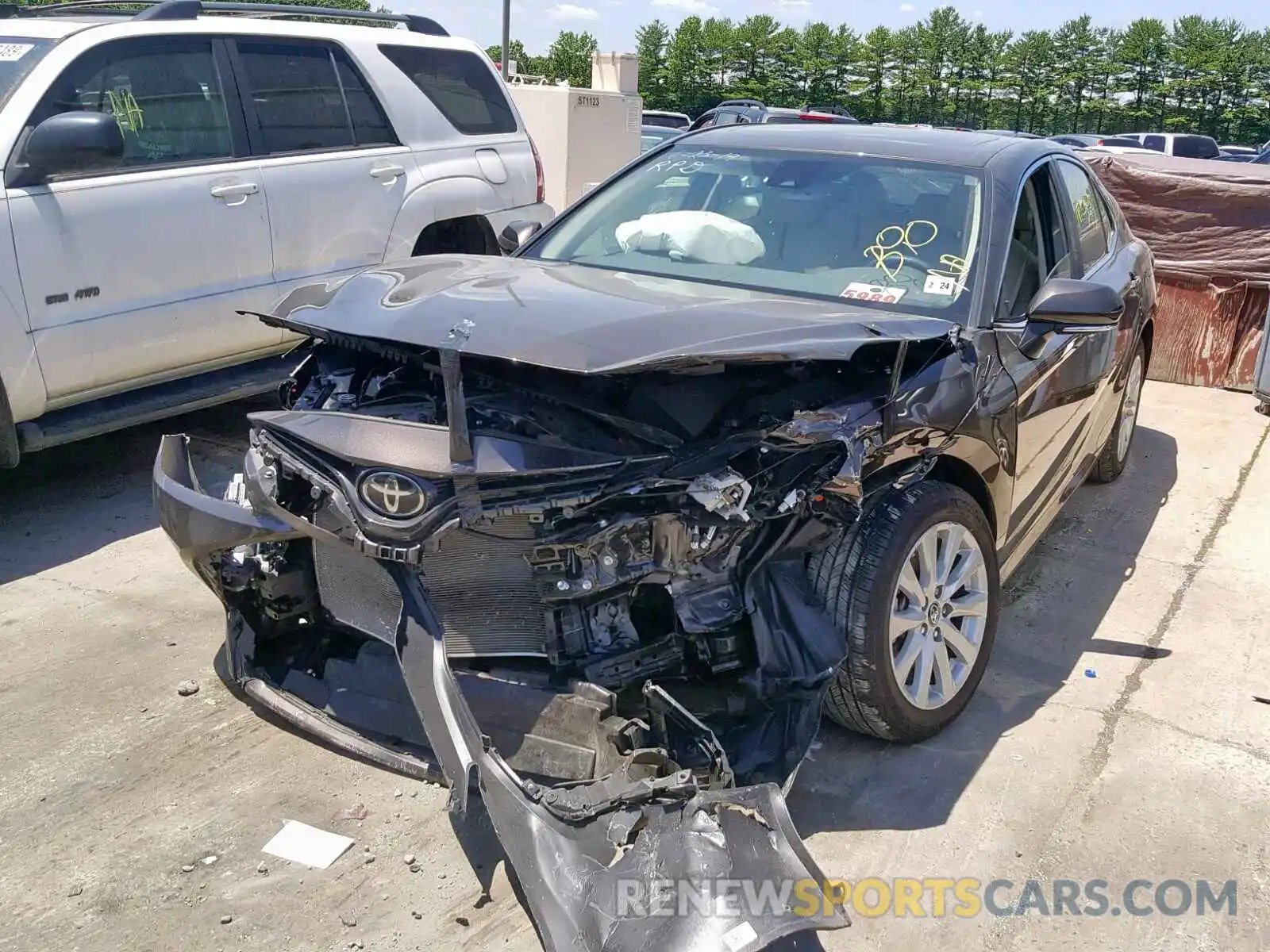 2 Photograph of a damaged car 4T1B11HK3KU734981 TOYOTA CAMRY 2019