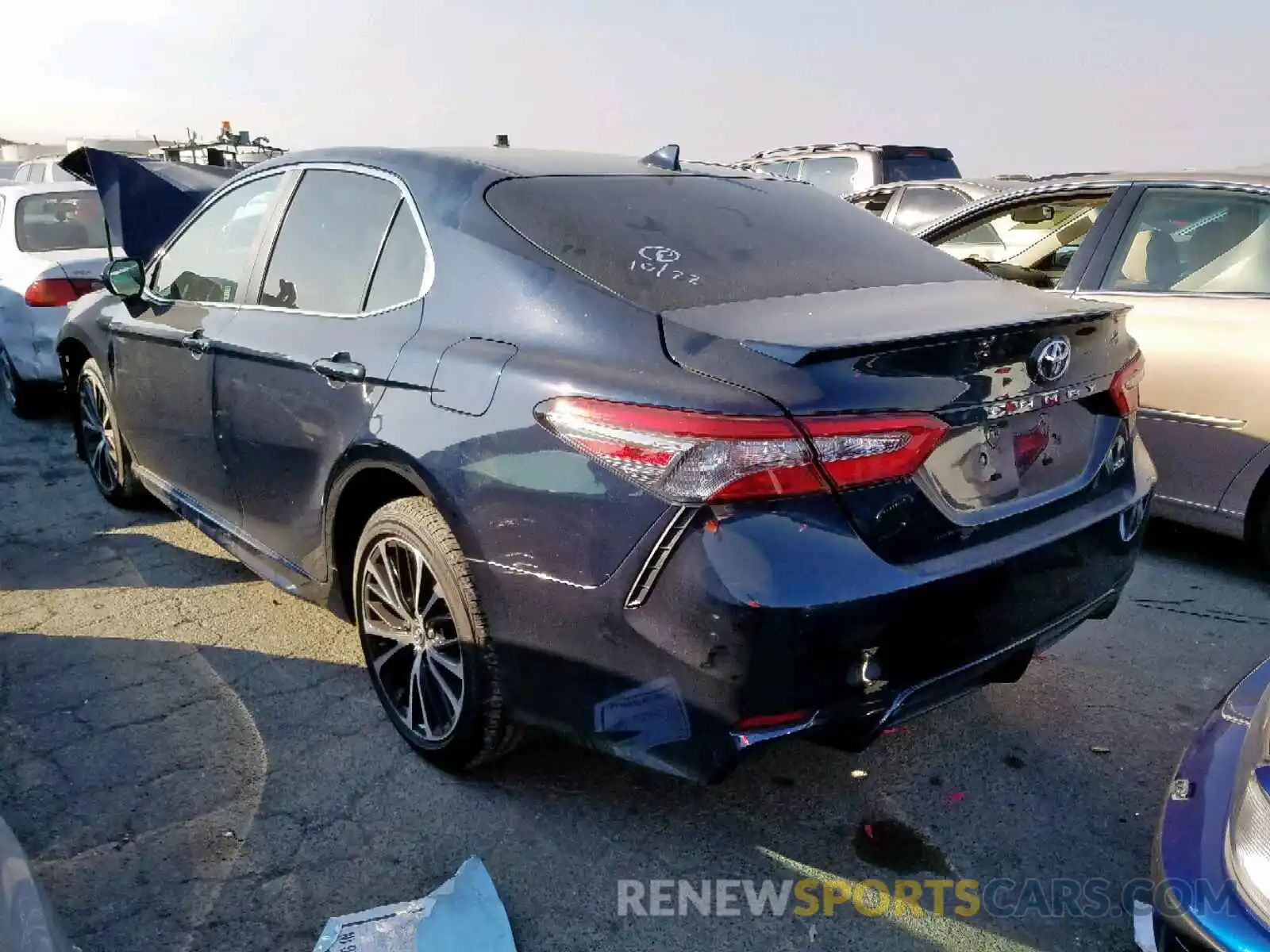 3 Photograph of a damaged car 4T1B11HK4KU701360 TOYOTA CAMRY 2019