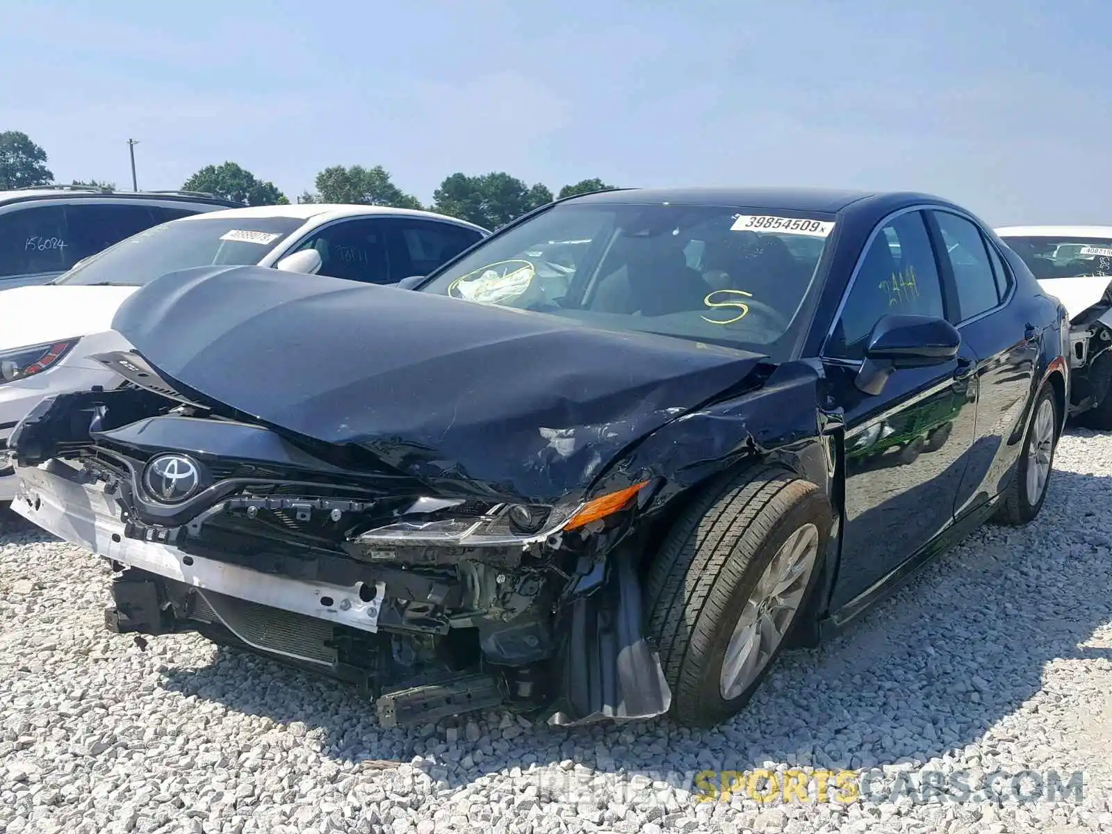 2 Photograph of a damaged car 4T1B11HK4KU731989 TOYOTA CAMRY 2019