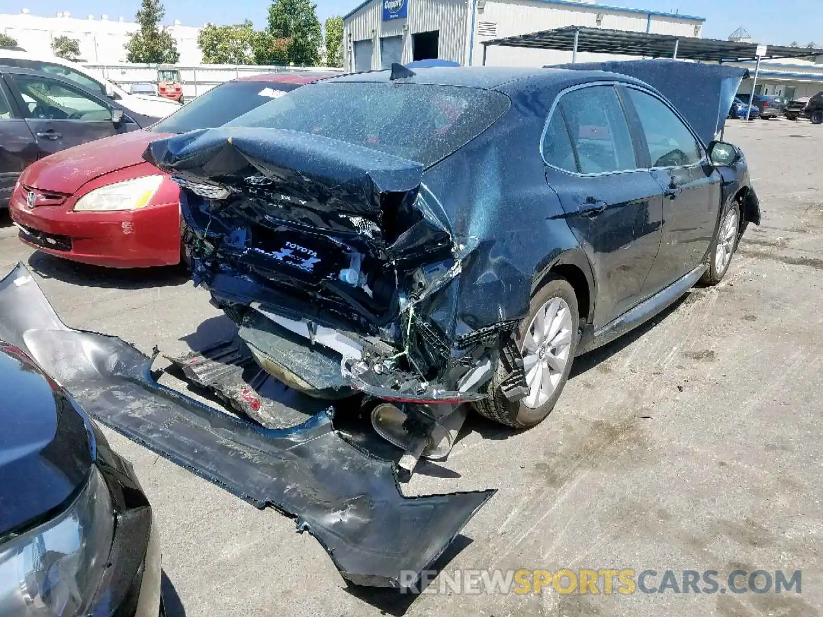 4 Photograph of a damaged car 4T1B11HK6KU234927 TOYOTA CAMRY 2019