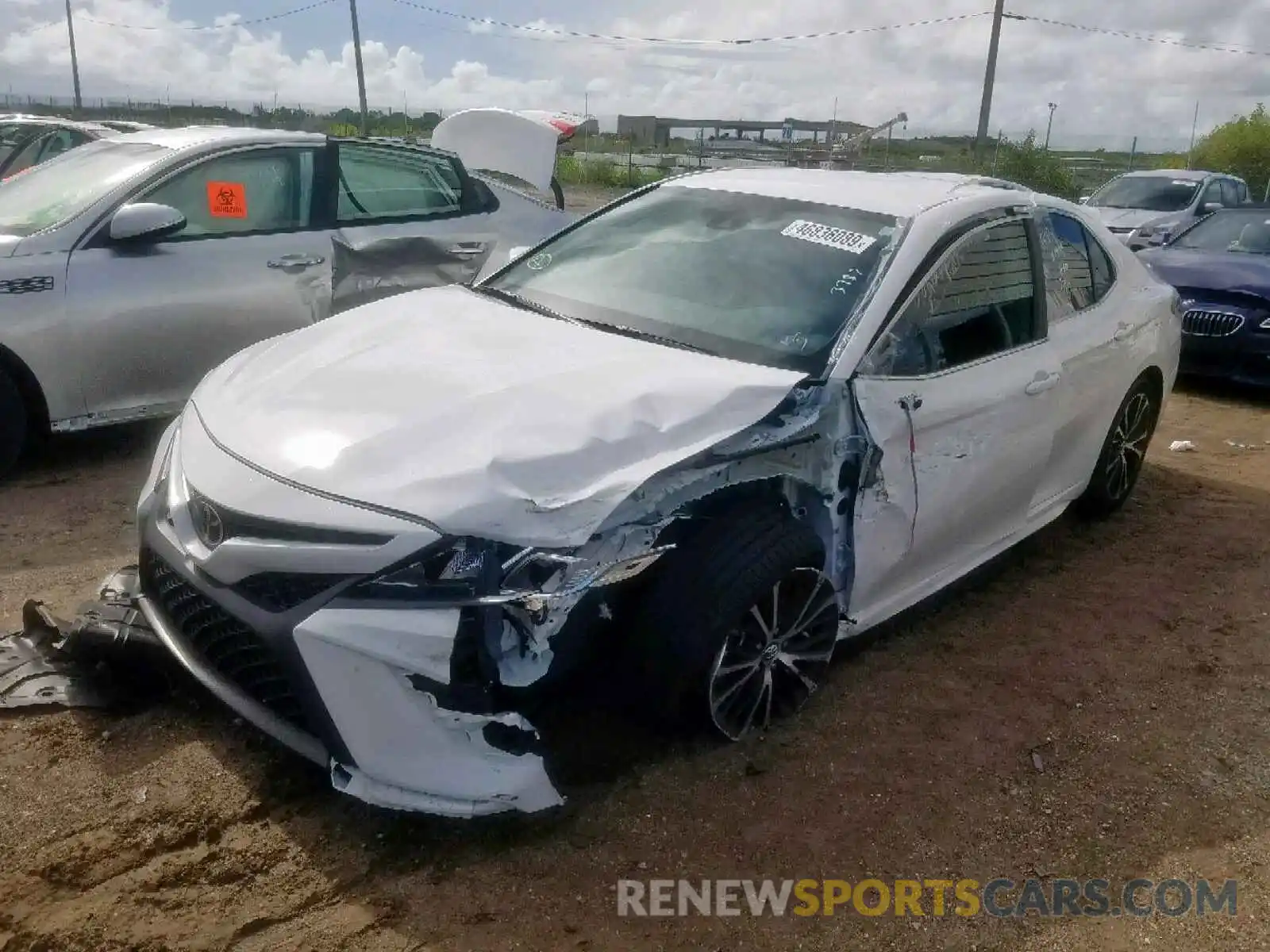 2 Photograph of a damaged car 4T1B11HK9KU763787 TOYOTA CAMRY 2019