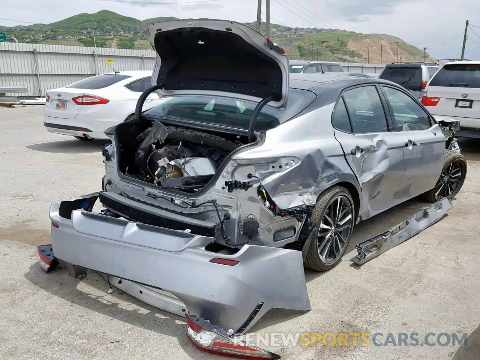 4 Photograph of a damaged car 4T1BZ1HK3KU023063 TOYOTA CAMRY 2019