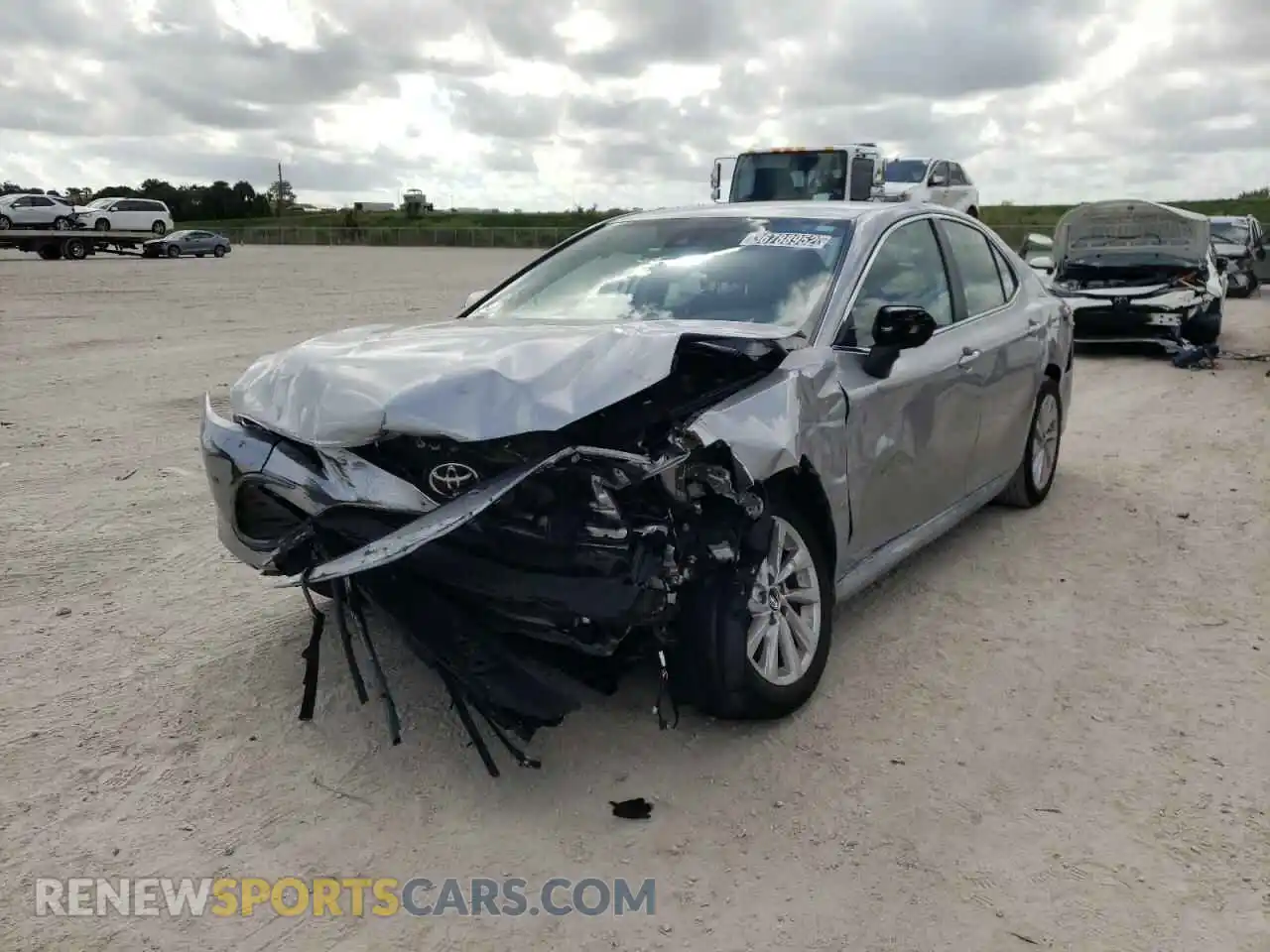 2 Photograph of a damaged car 4T1C11AKXMU576835 TOYOTA CAMRY 2021