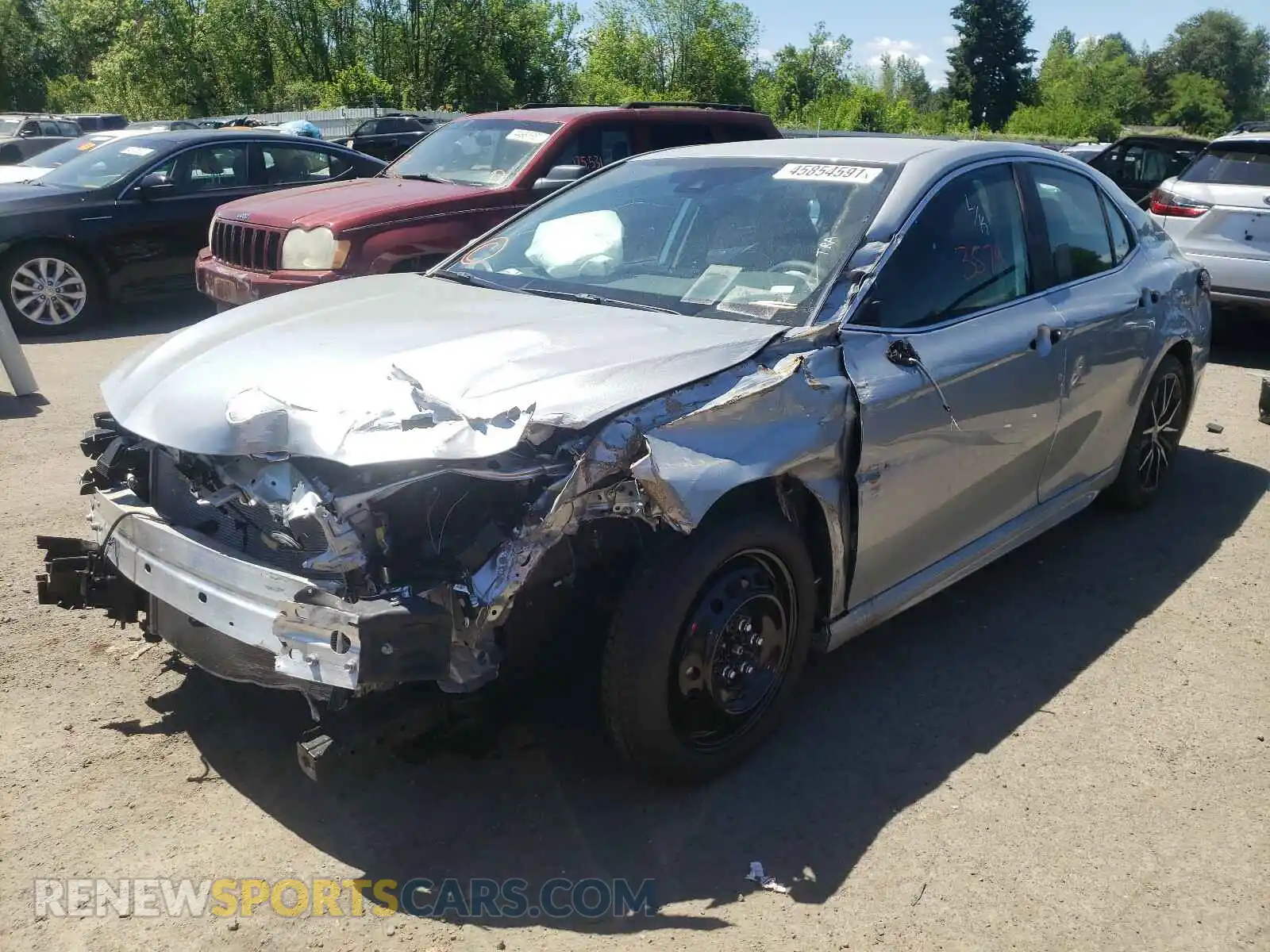2 Photograph of a damaged car 4T1G11AKXMU525014 TOYOTA CAMRY 2021