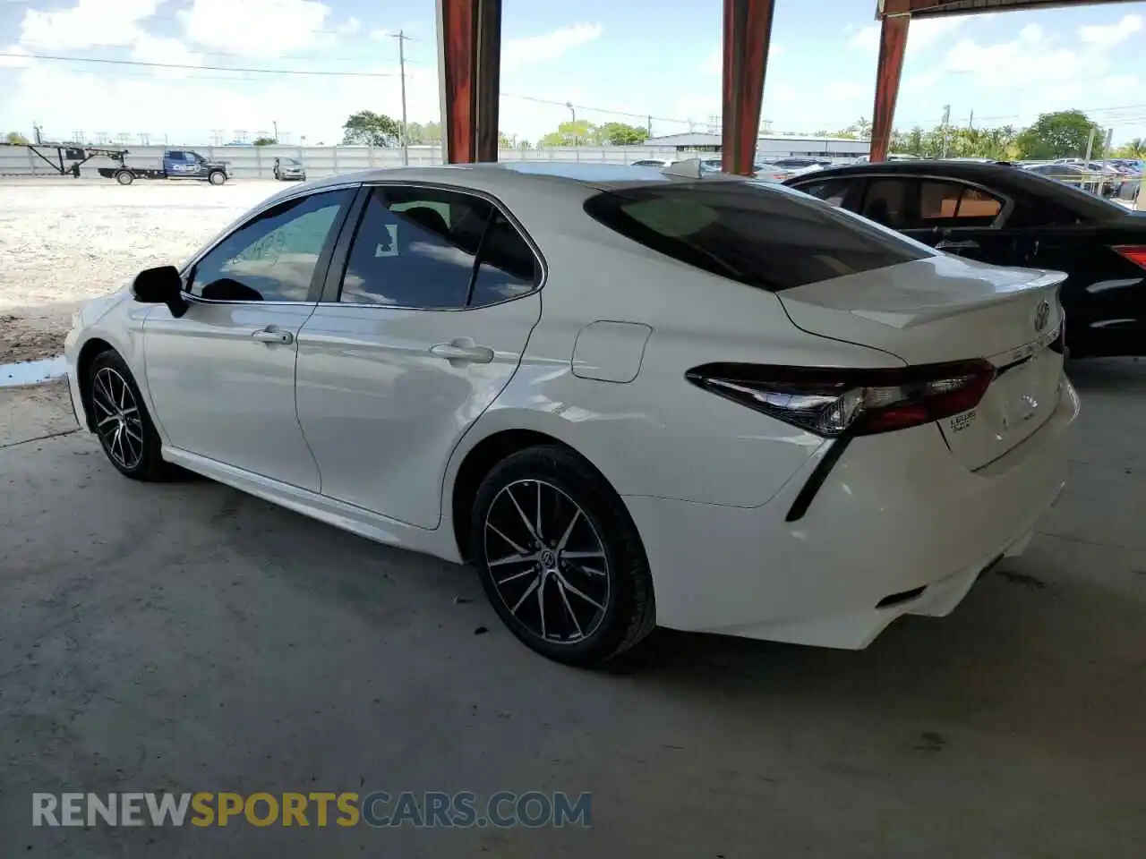 2 Photograph of a damaged car 4T1G11AKXMU559759 TOYOTA CAMRY 2021