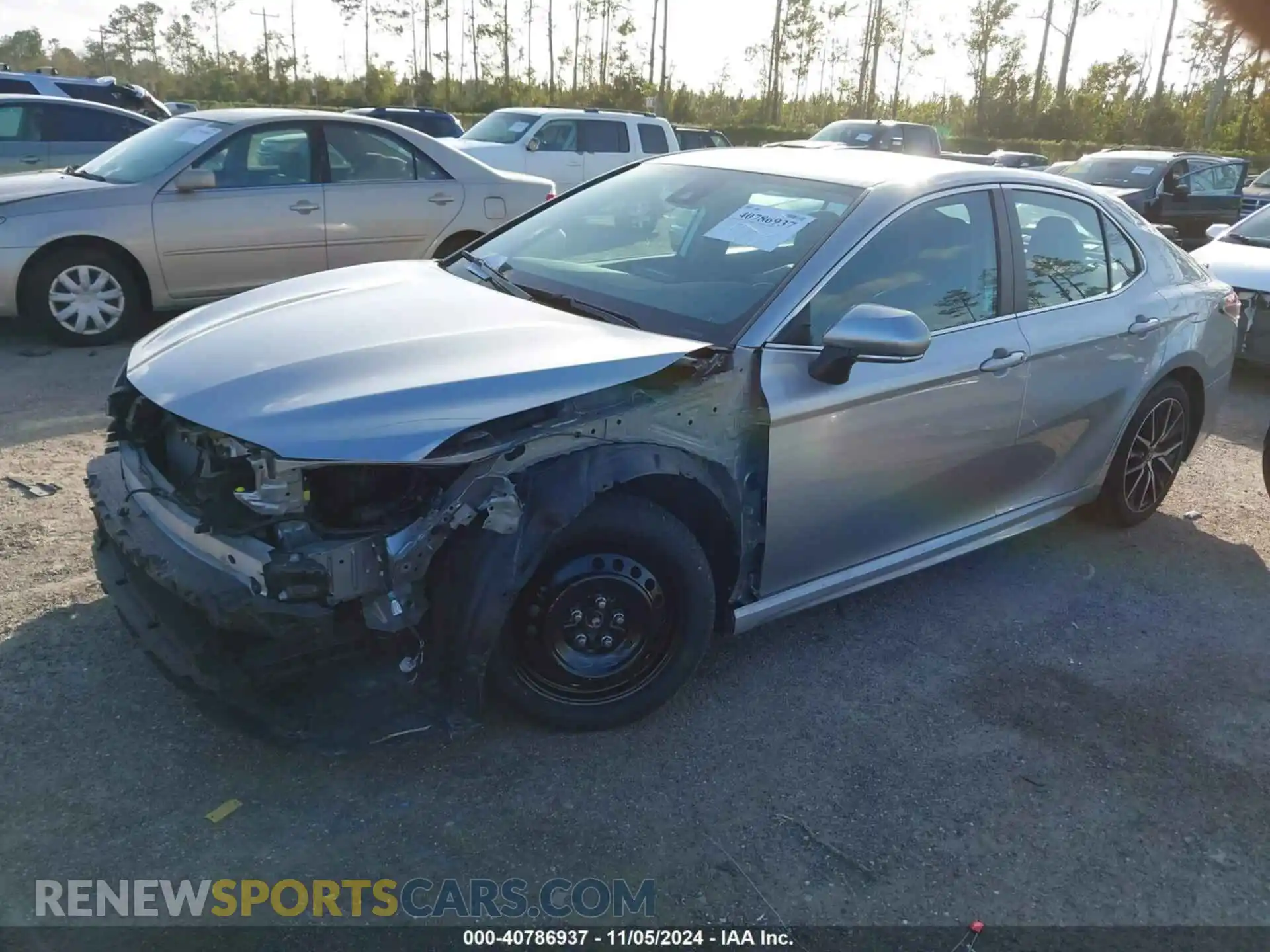 2 fotografías del automóvil dañado 4T1G11AKXPU736895 TOYOTA CAMRY 2023