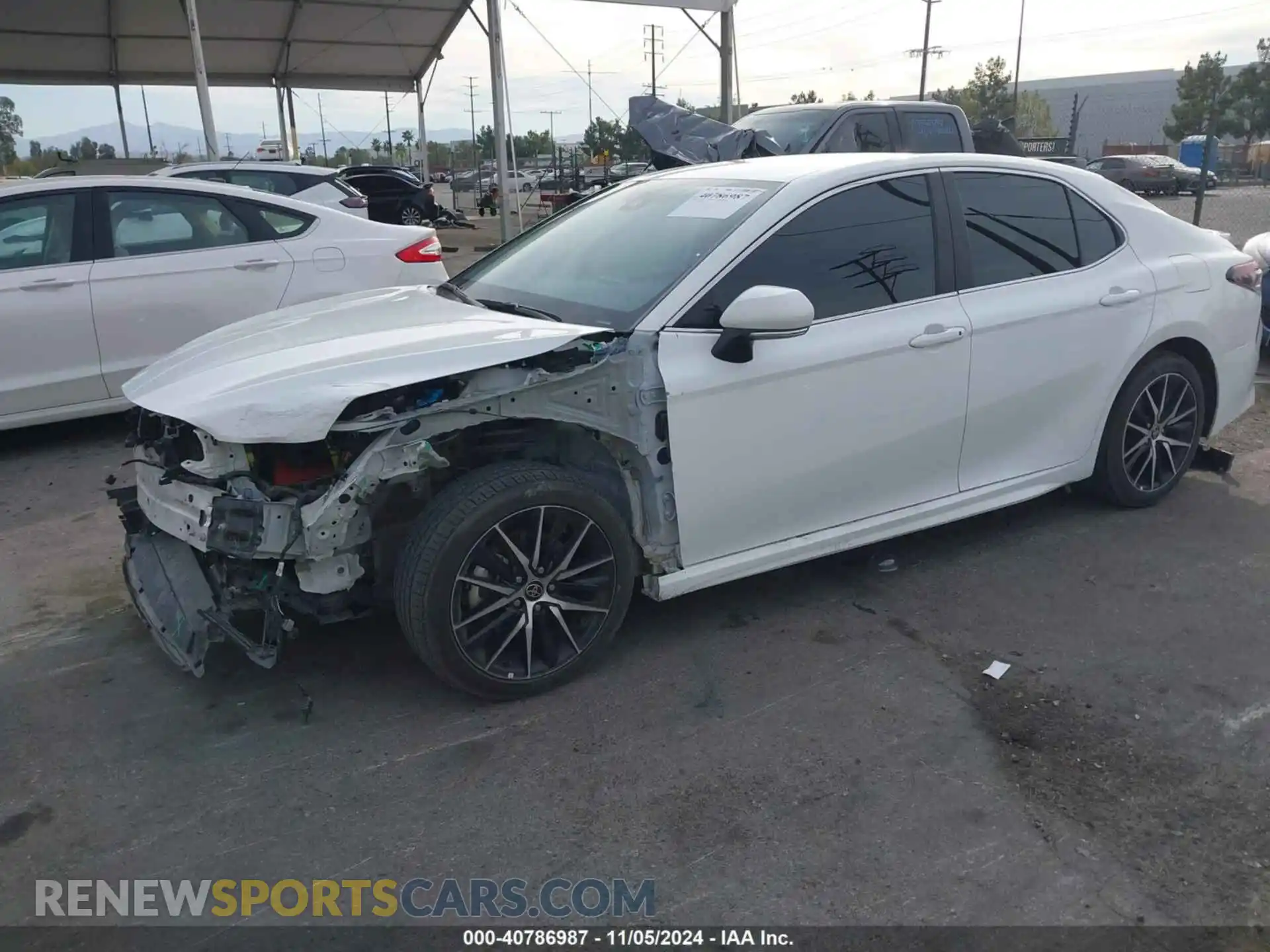 2 fotografías del automóvil dañado 4T1T11AK6PU809971 TOYOTA CAMRY 2023