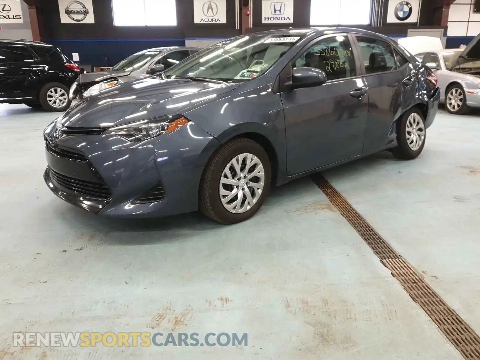2 fotografías del automóvil dañado 2T1BURHE7KC240091 TOYOTA COROLLA 2019
