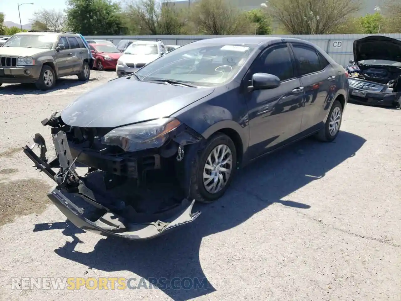 2 fotografías del automóvil dañado 2T1BURHE8KC163327 TOYOTA COROLLA 2019