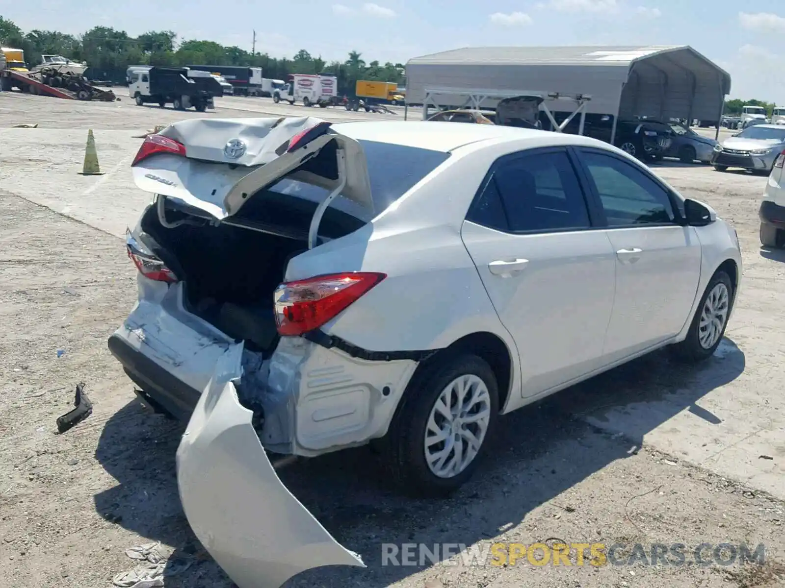 4 Photograph of a damaged car 5YFBURHE1KP882502 TOYOTA COROLLA 2019