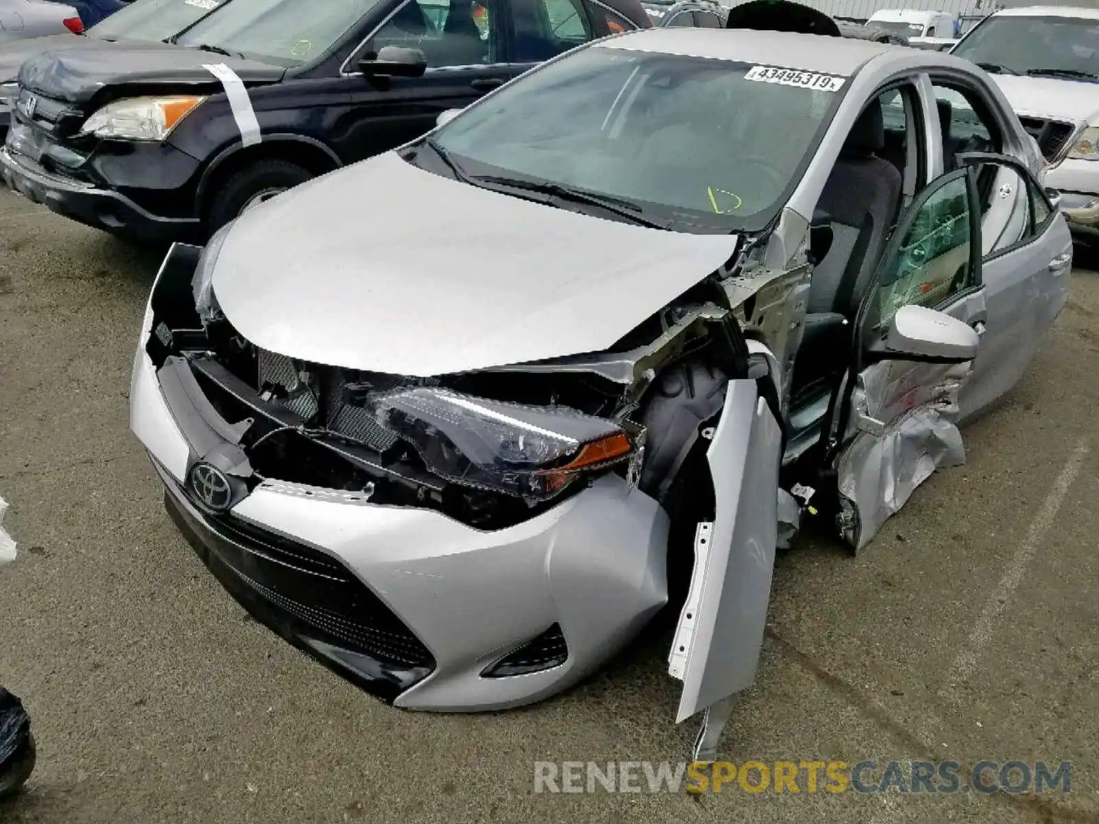 2 Photograph of a damaged car 5YFBURHE2KP869306 TOYOTA COROLLA 2019