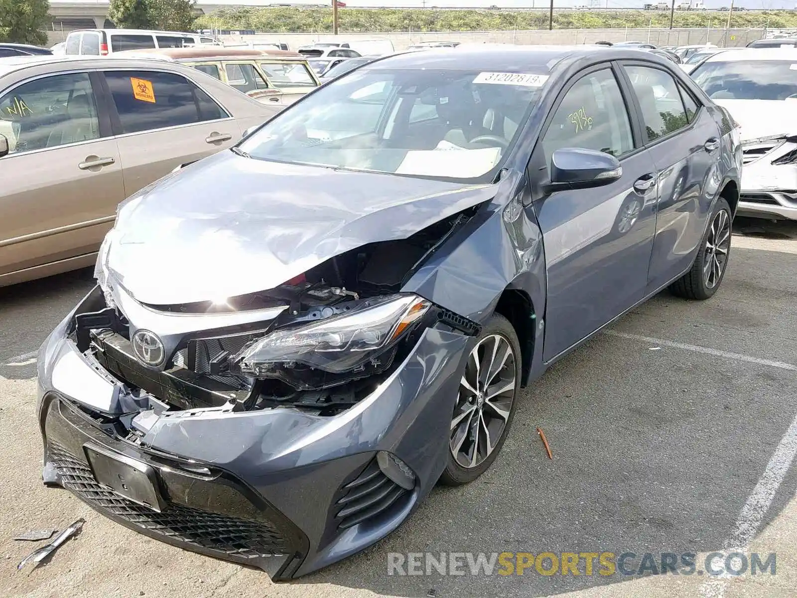 2 Photograph of a damaged car 5YFBURHE4KP916609 TOYOTA COROLLA 2019